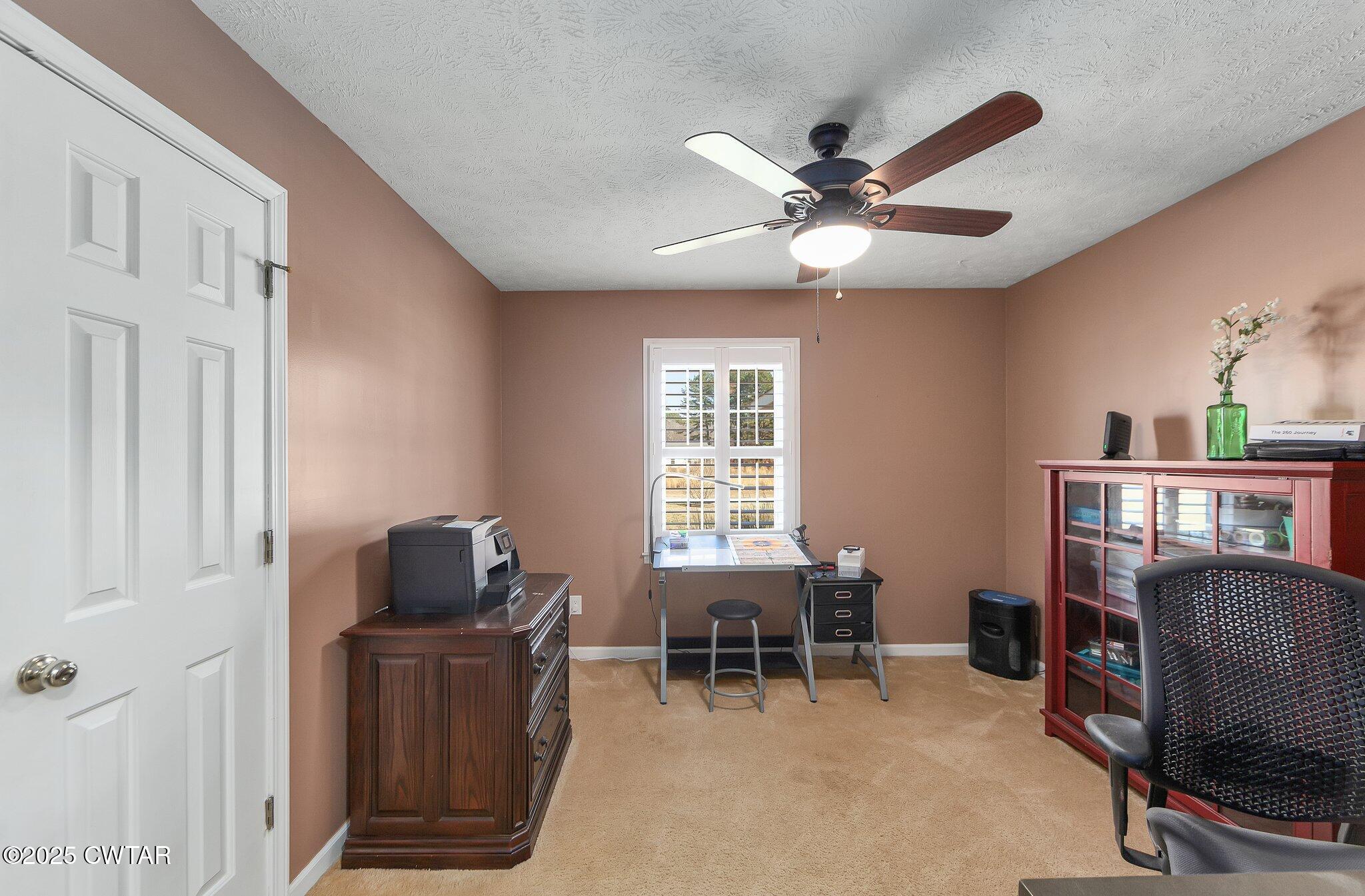 280 St Road Beech Bluff, TN 38313 - Photo 15 of 46 a view of a workspace with furniture and a window