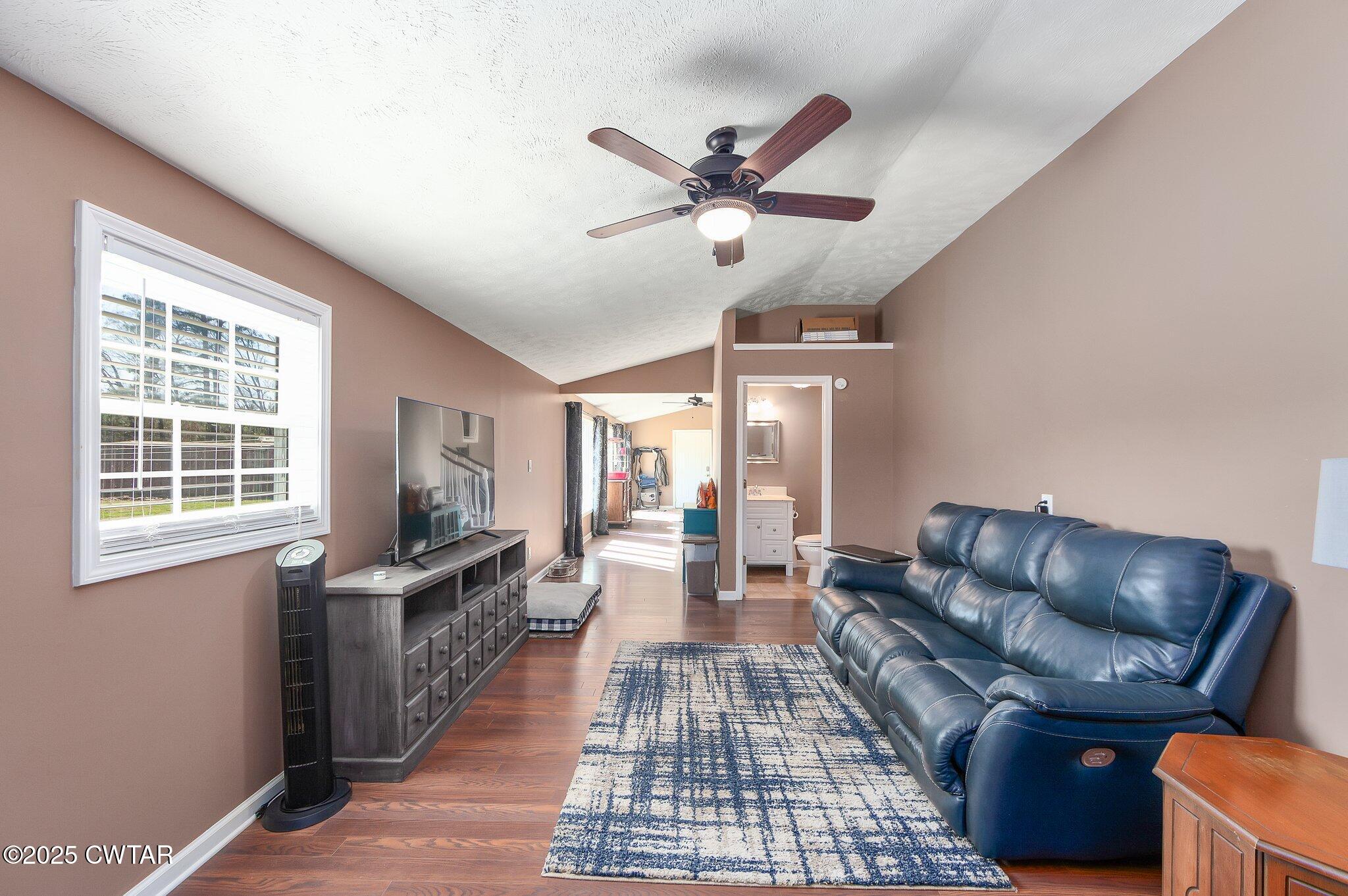 280 St Road Beech Bluff, TN 38313 - Photo 18 of 46 a living room with furniture and a large window