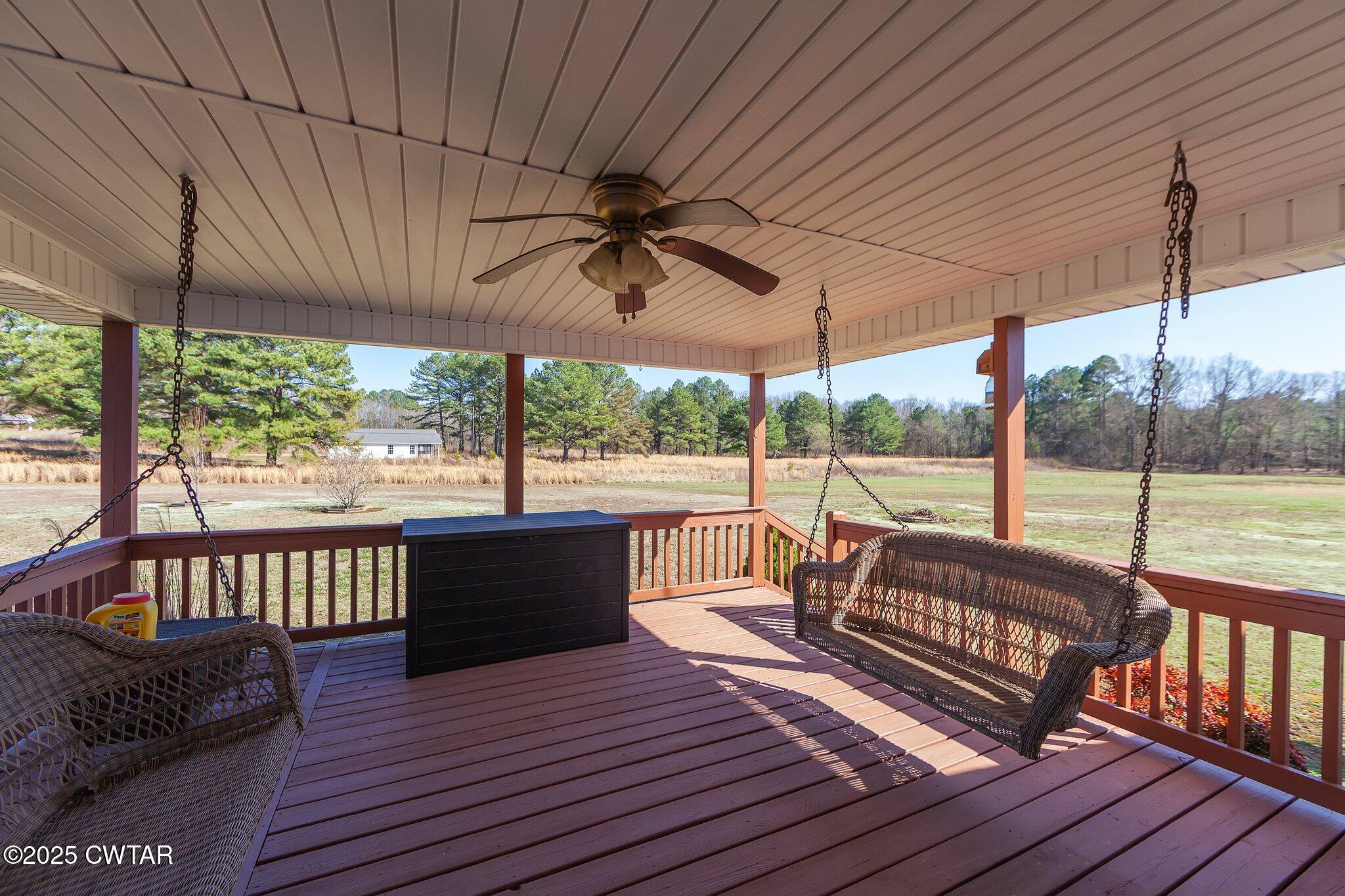 280 St Road Beech Bluff, TN 38313 - Photo 23 of 46 a view of a porch with furniture and wooden floor