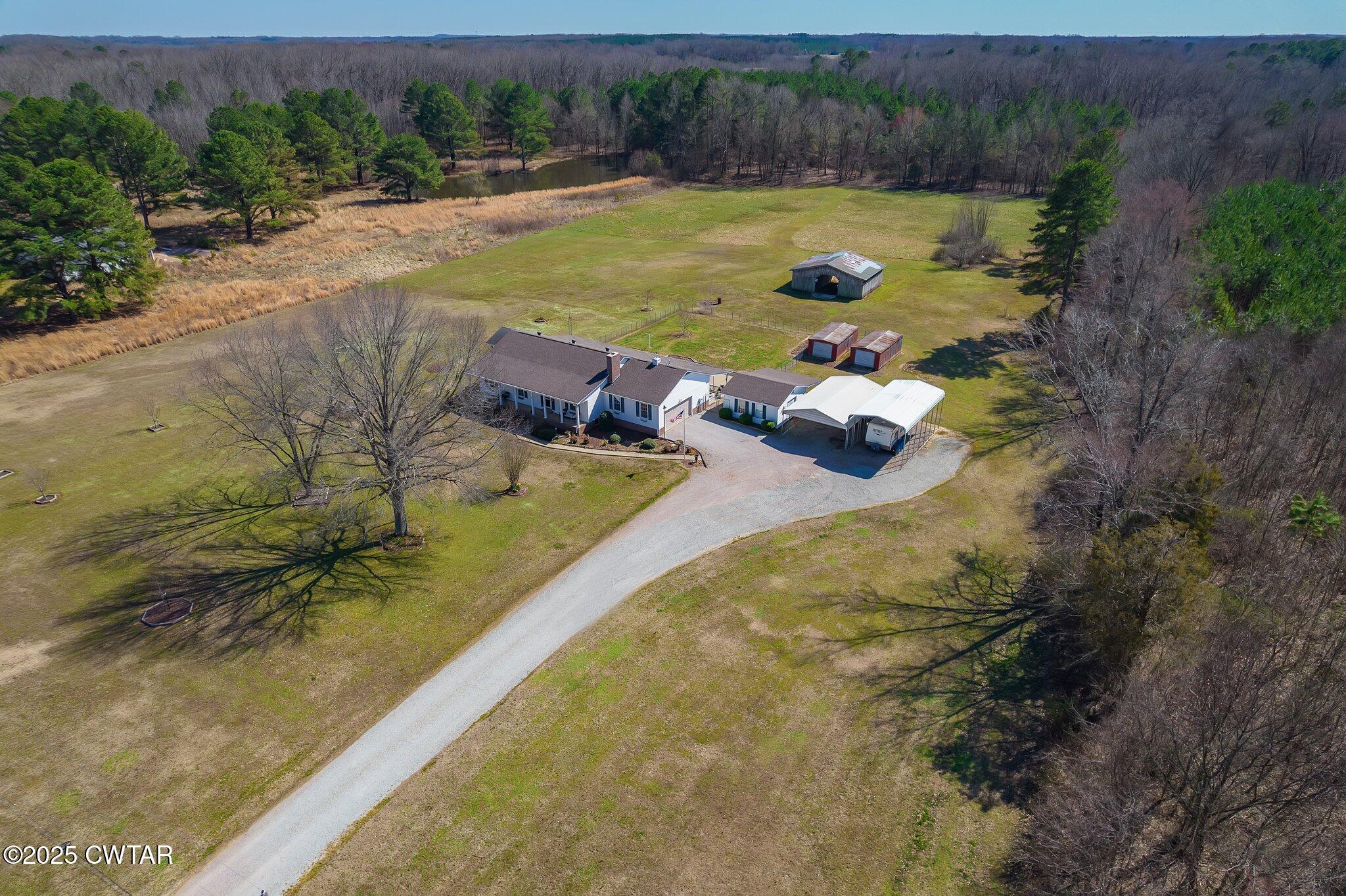 280 St Road Beech Bluff, TN 38313 - Photo 34 of 46 a view of a swimming pool and lounge chair