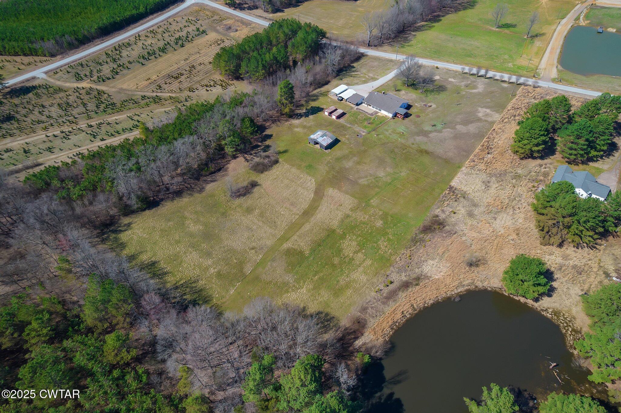 280 St Road Beech Bluff, TN 38313 - Photo 38 of 46 an aerial view of residential house with outdoor space