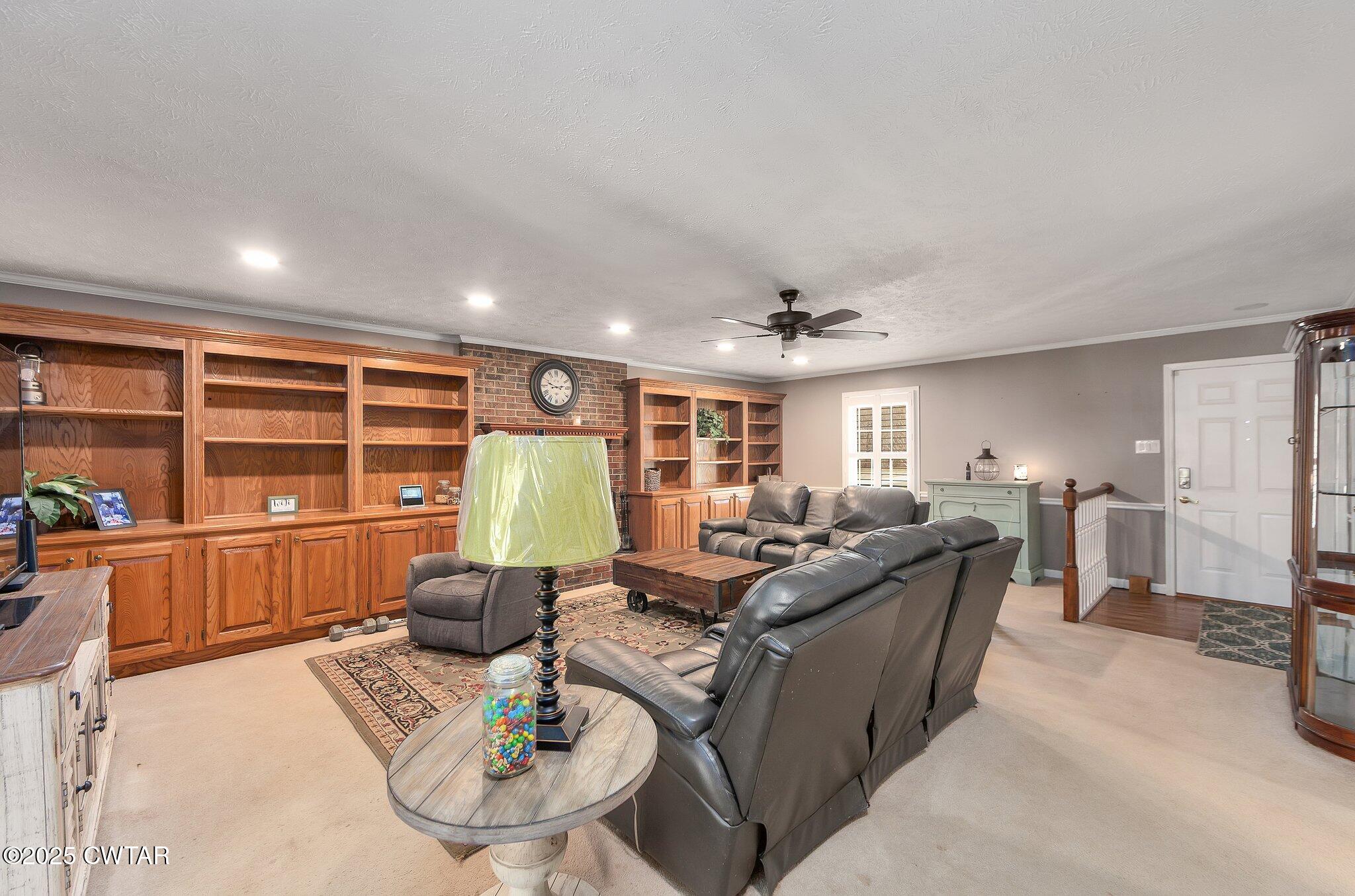 280 St Road Beech Bluff, TN 38313 - Photo 4 of 46 a living room with furniture a large window and wooden floor