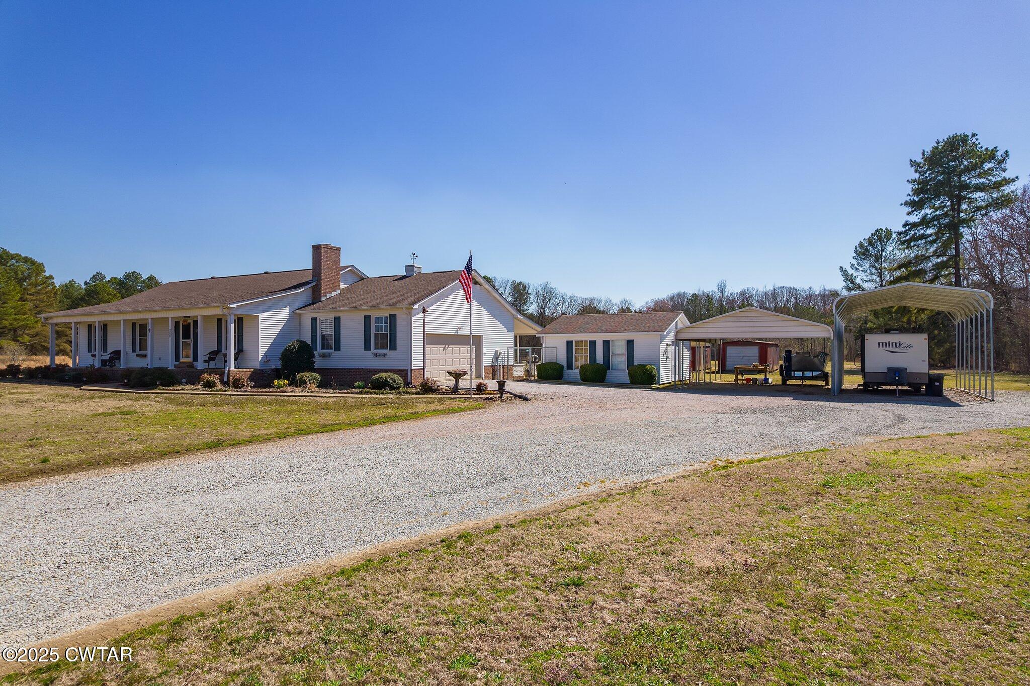 280 St Road Beech Bluff, TN 38313 - Photo 46 of 46 a front view of a house with swimming pool and porch