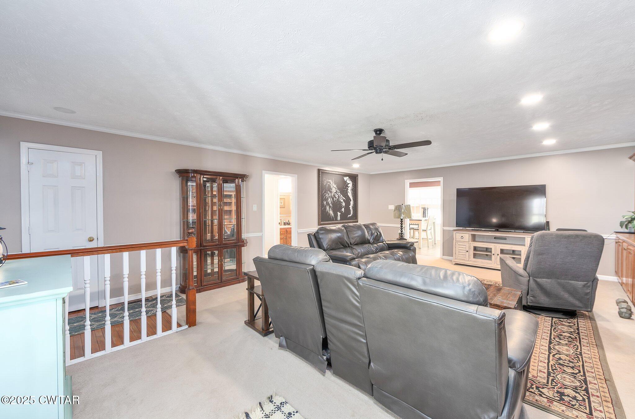 280 St Road Beech Bluff, TN 38313 - Photo 5 of 46 a living room with furniture and a flat screen tv