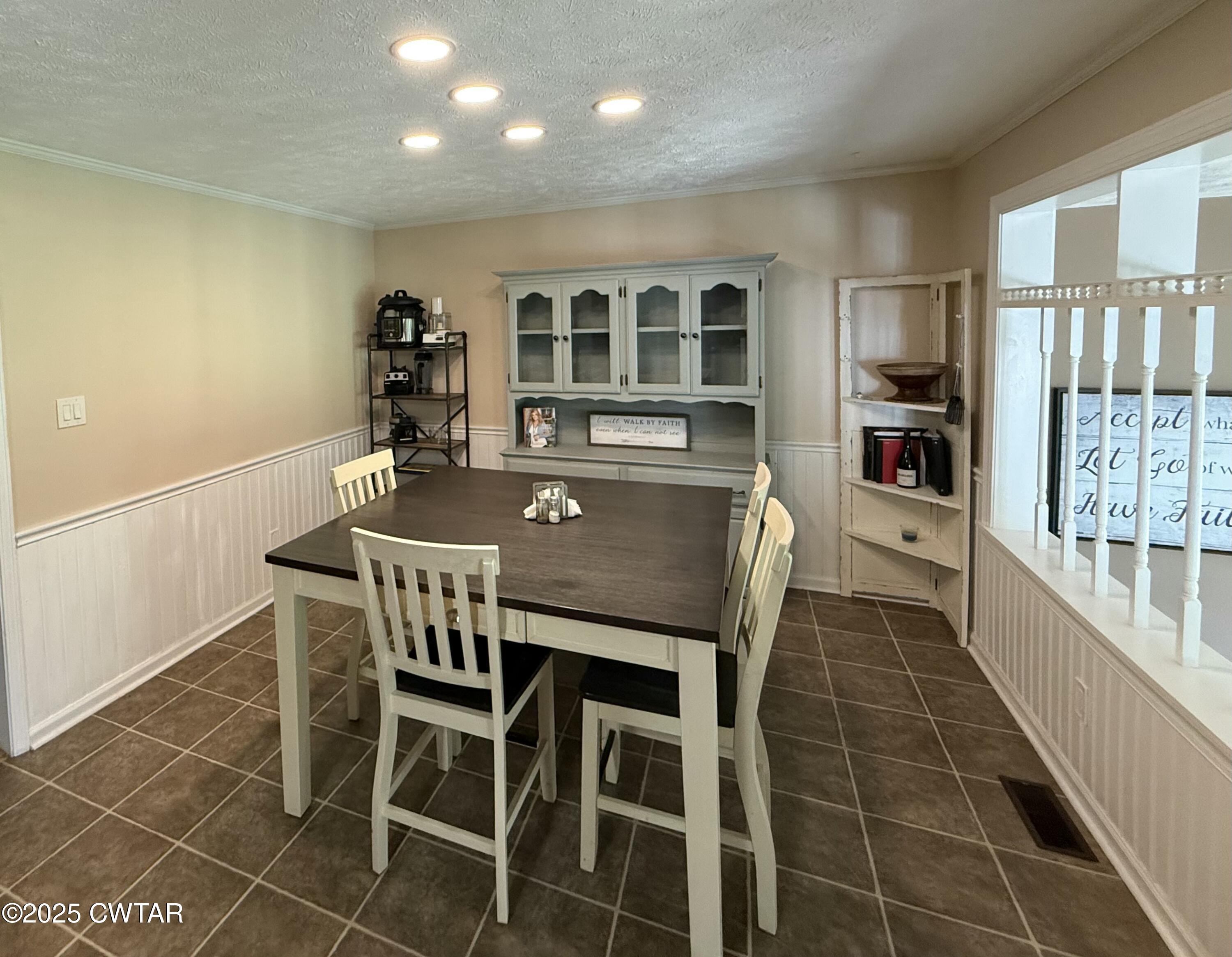 280 St Road Beech Bluff, TN 38313 - Photo 9 of 46 a view of a dining room with furniture and a potted plant