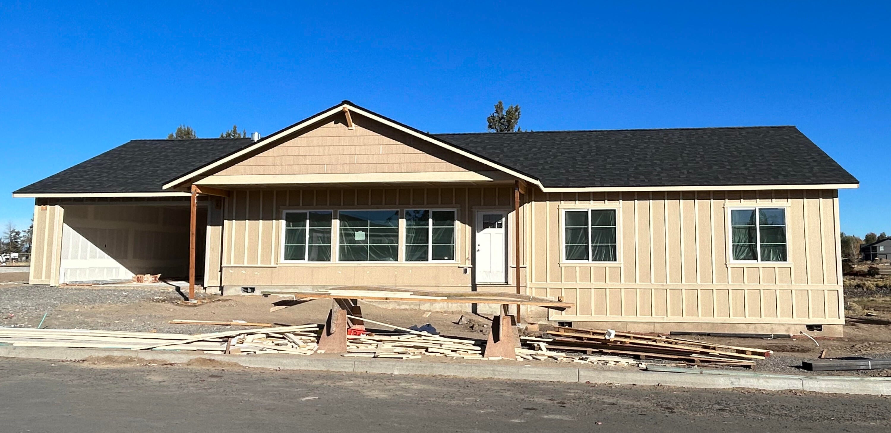 4809 Southwest Yew Place, Unit LOT 17 Redmond, OR 97756 - Photo 2 of 7 Front view of The Maple, Lot 17. Photo taken 10-17-23.