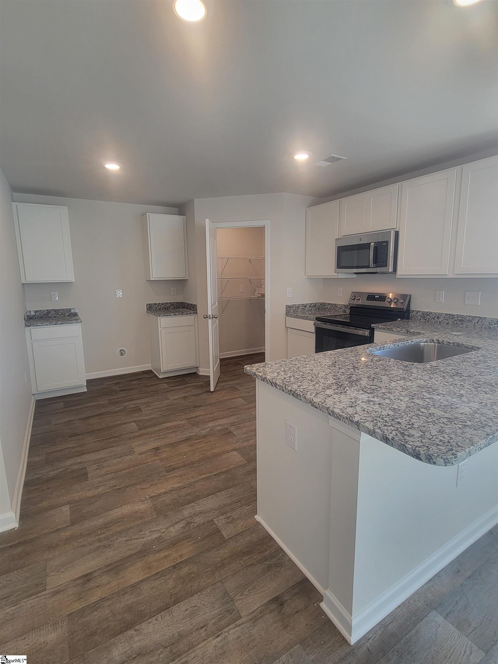 216 Green Pasture Road Fountain Inn, SC 29644 - Photo 14 of 19 Side view of kitchen