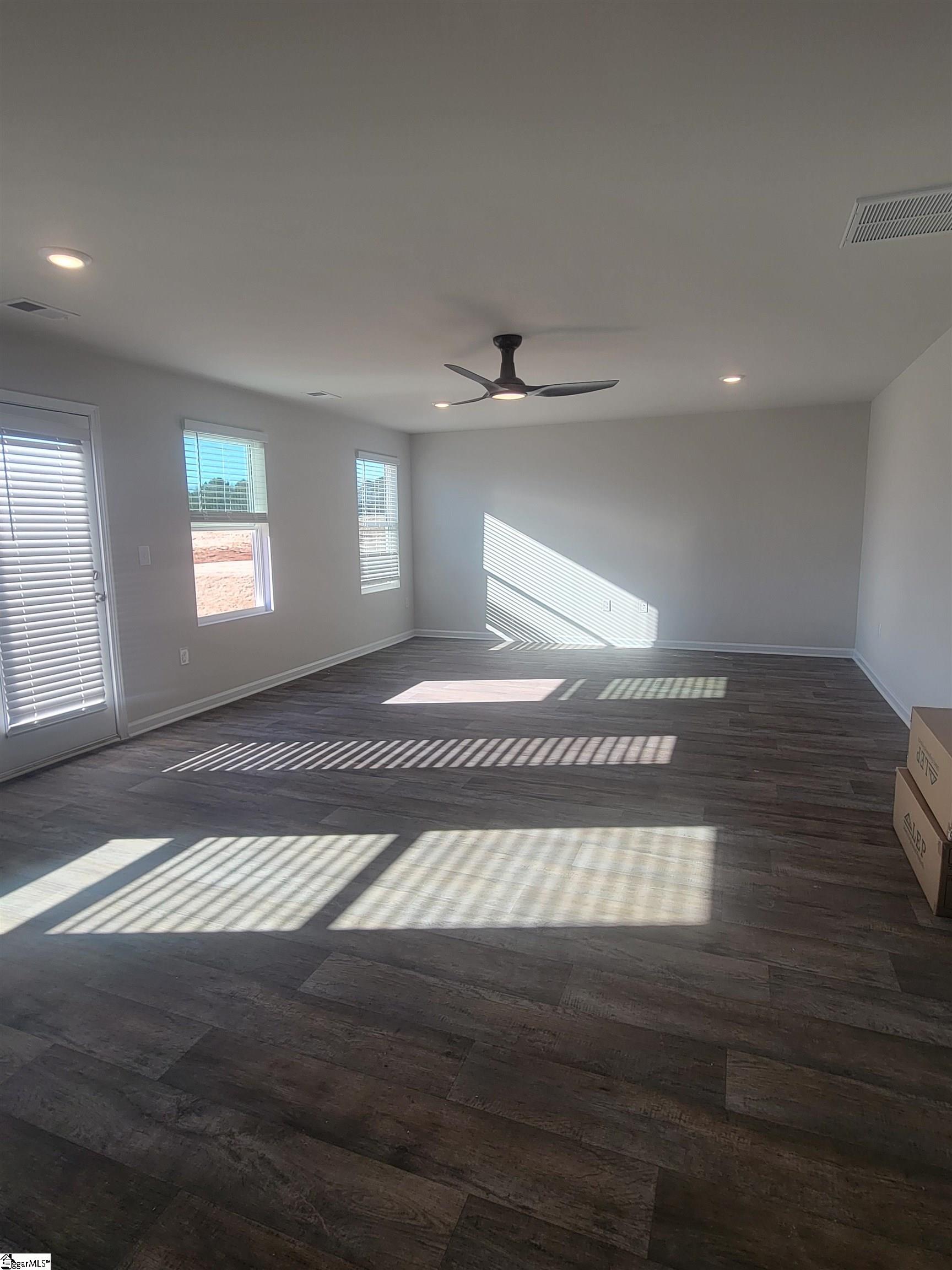 216 Green Pasture Road Fountain Inn, SC 29644 - Photo 15 of 19 Family room with a portion of the dining room