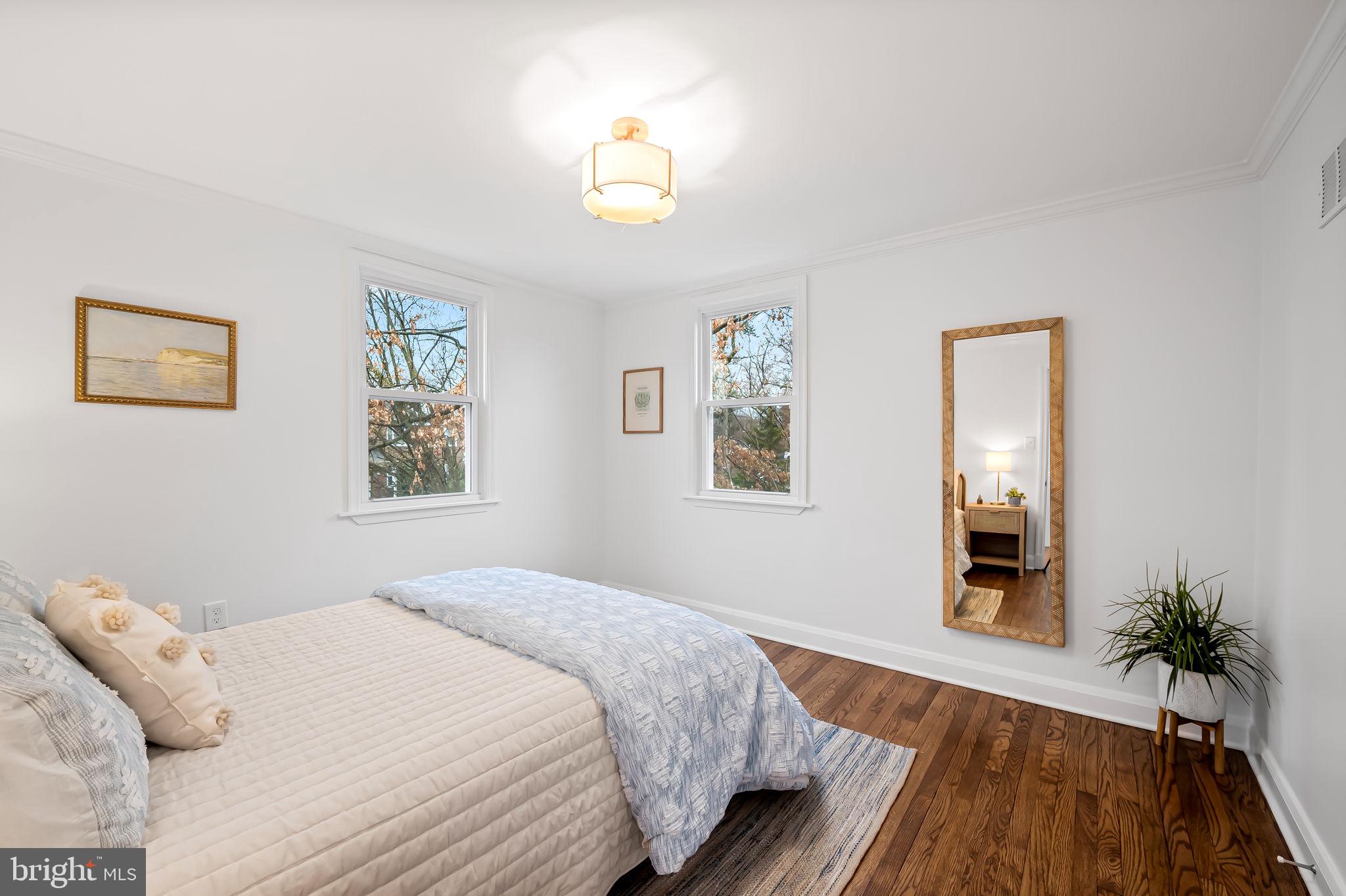 834 Evesham Avenue Baltimore, MD 21212 - Photo 14 of 37 a bedroom with bed and a window