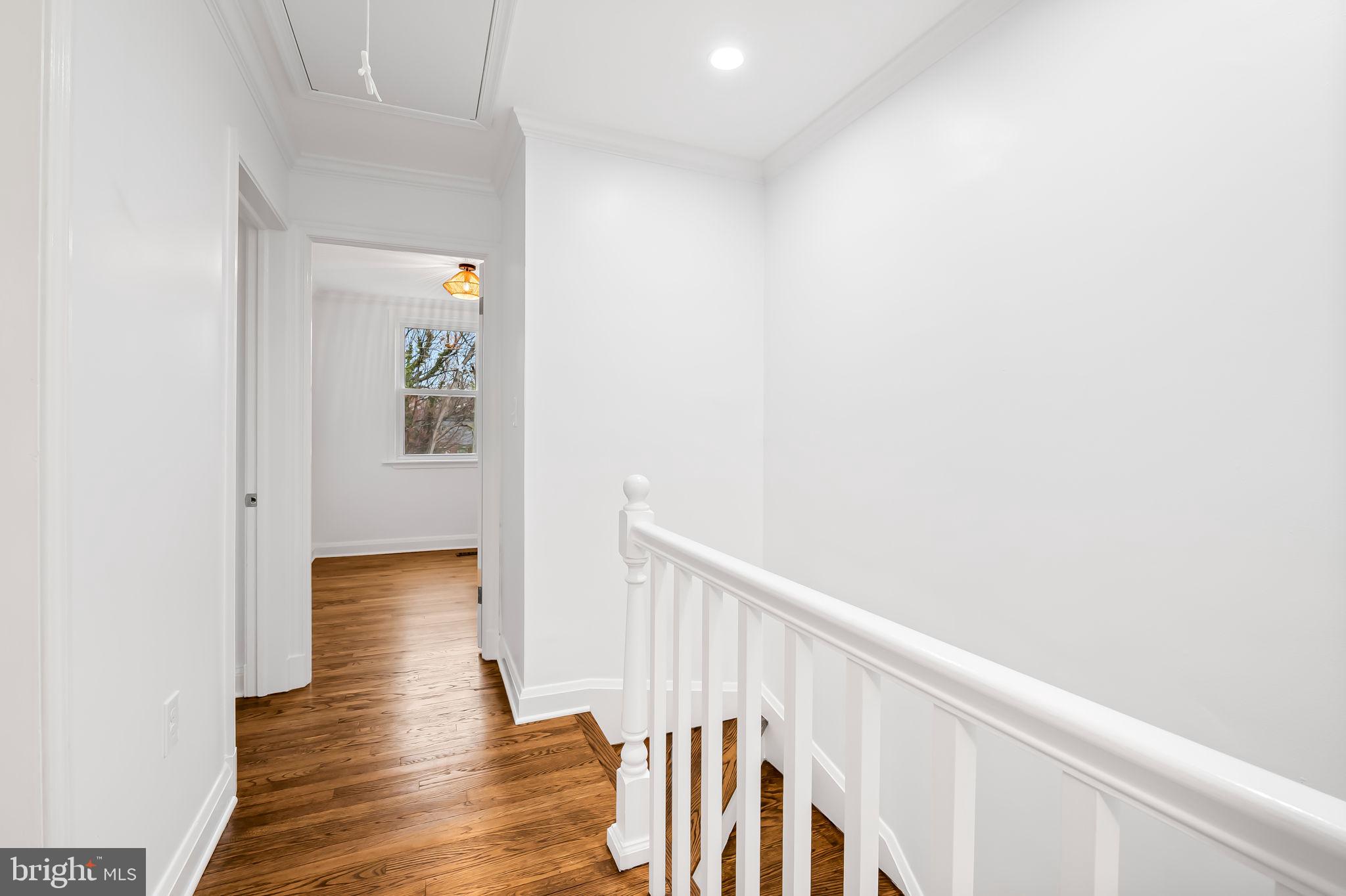 834 Evesham Avenue Baltimore, MD 21212 - Photo 20 of 37 a view of hallway with wooden floor