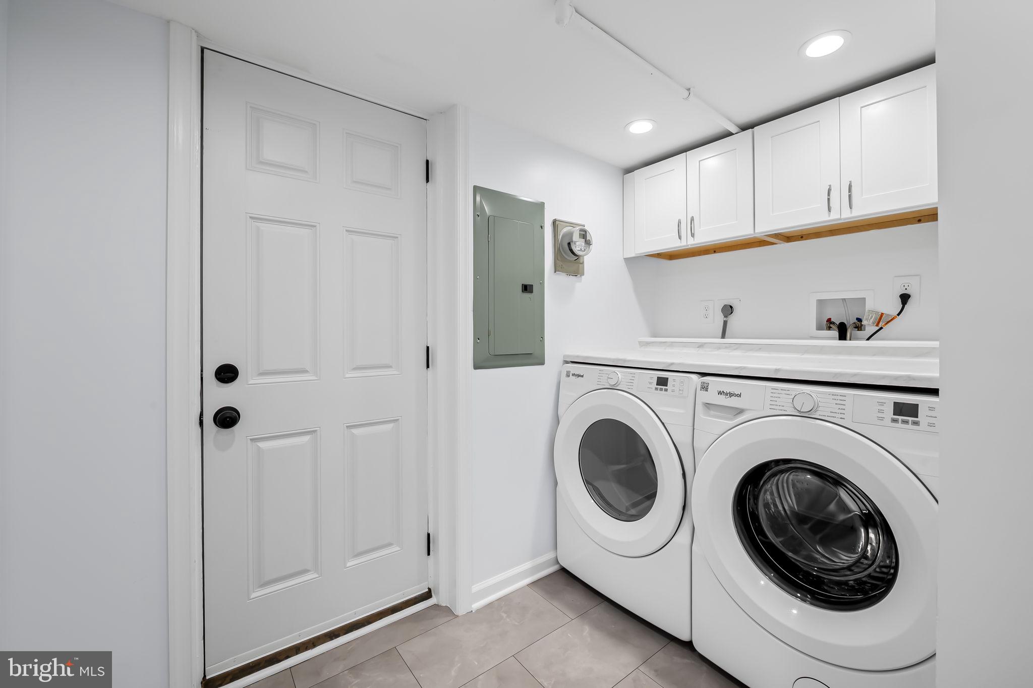 834 Evesham Avenue Baltimore, MD 21212 - Photo 26 of 37 a view of hallway with washer and dryer