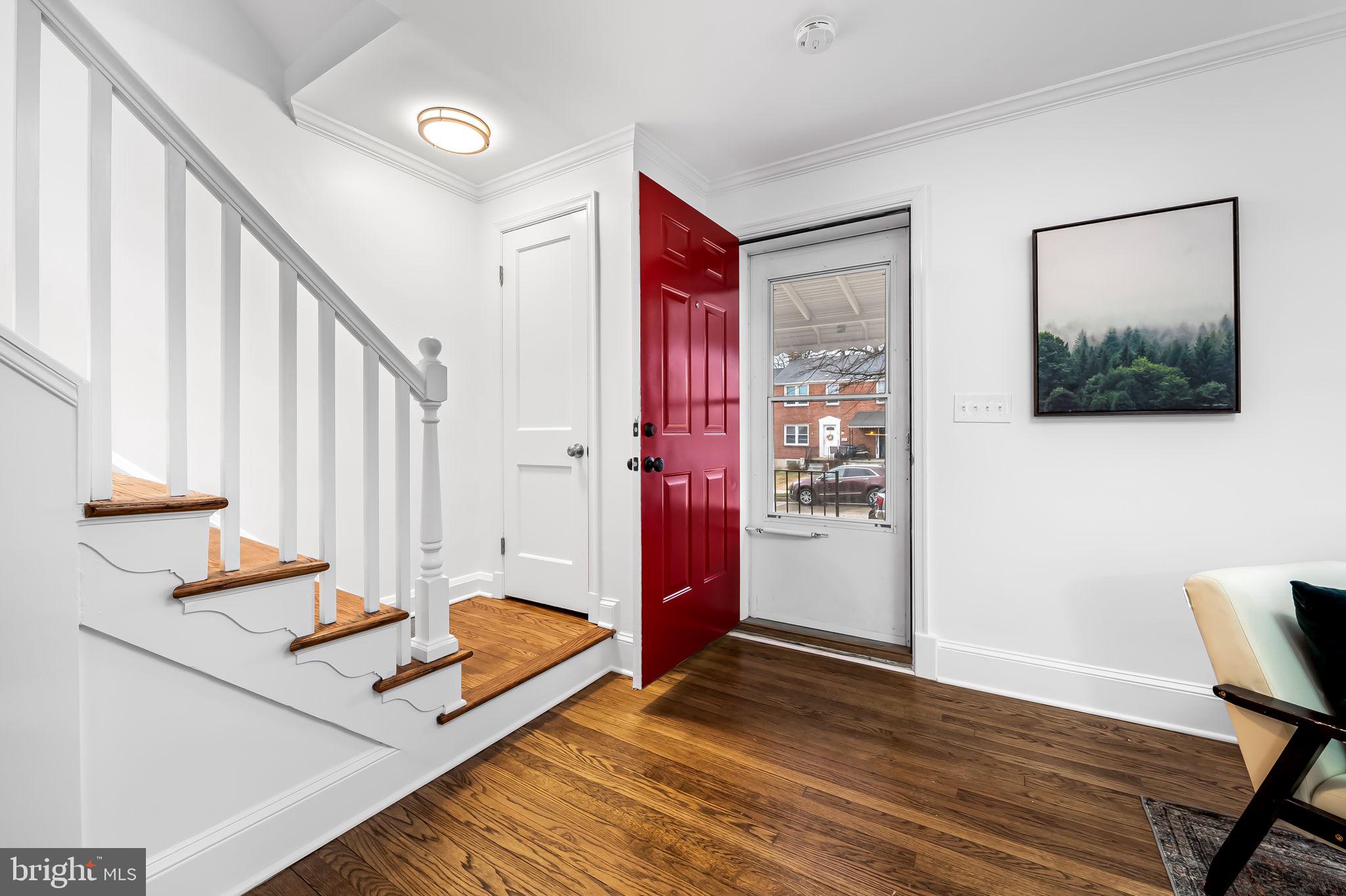 834 Evesham Avenue Baltimore, MD 21212 - Photo 3 of 37 a living room with furniture and a window