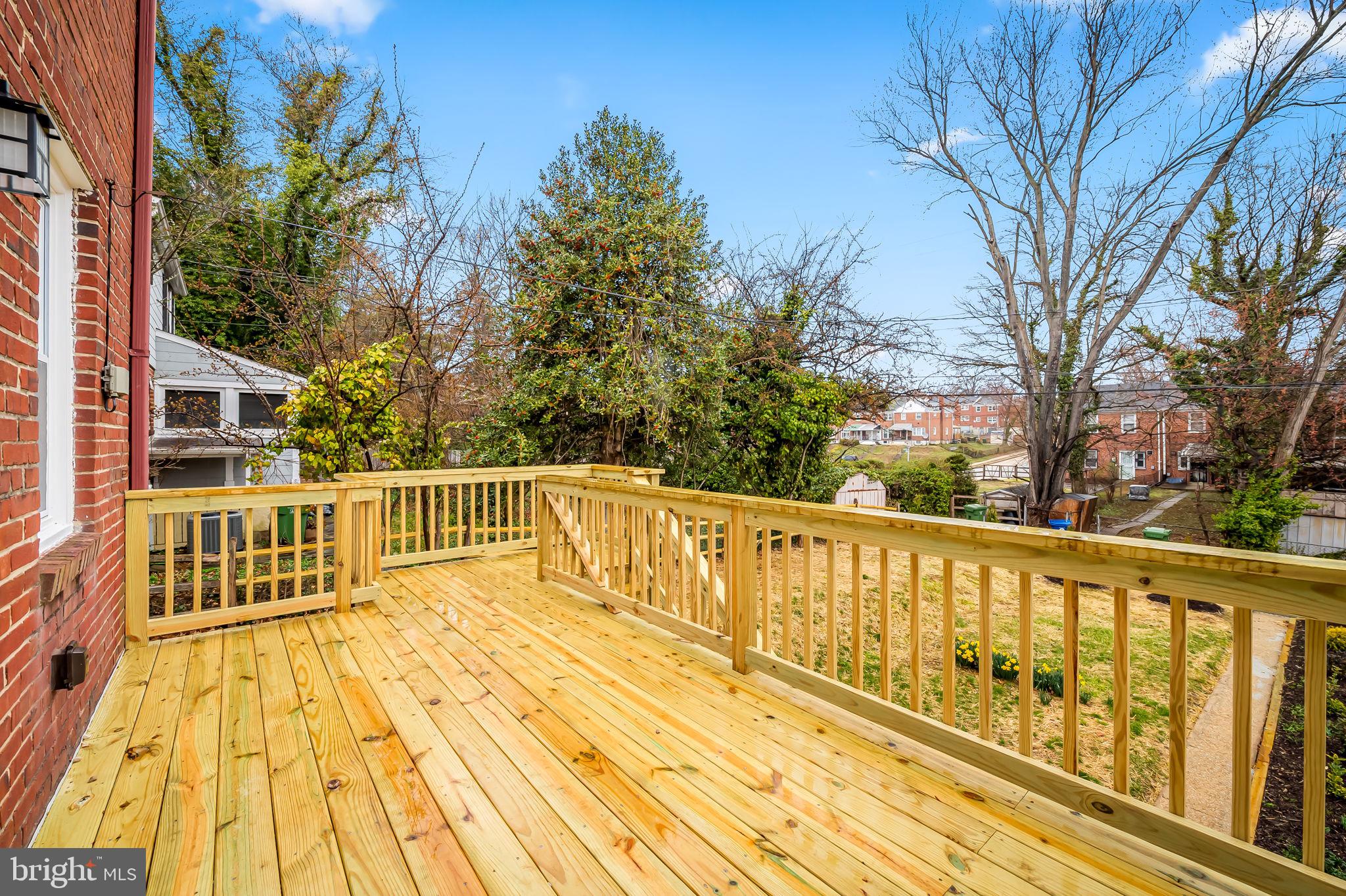 834 Evesham Avenue Baltimore, MD 21212 - Photo 33 of 37 a view of balcony with wooden floor and fence