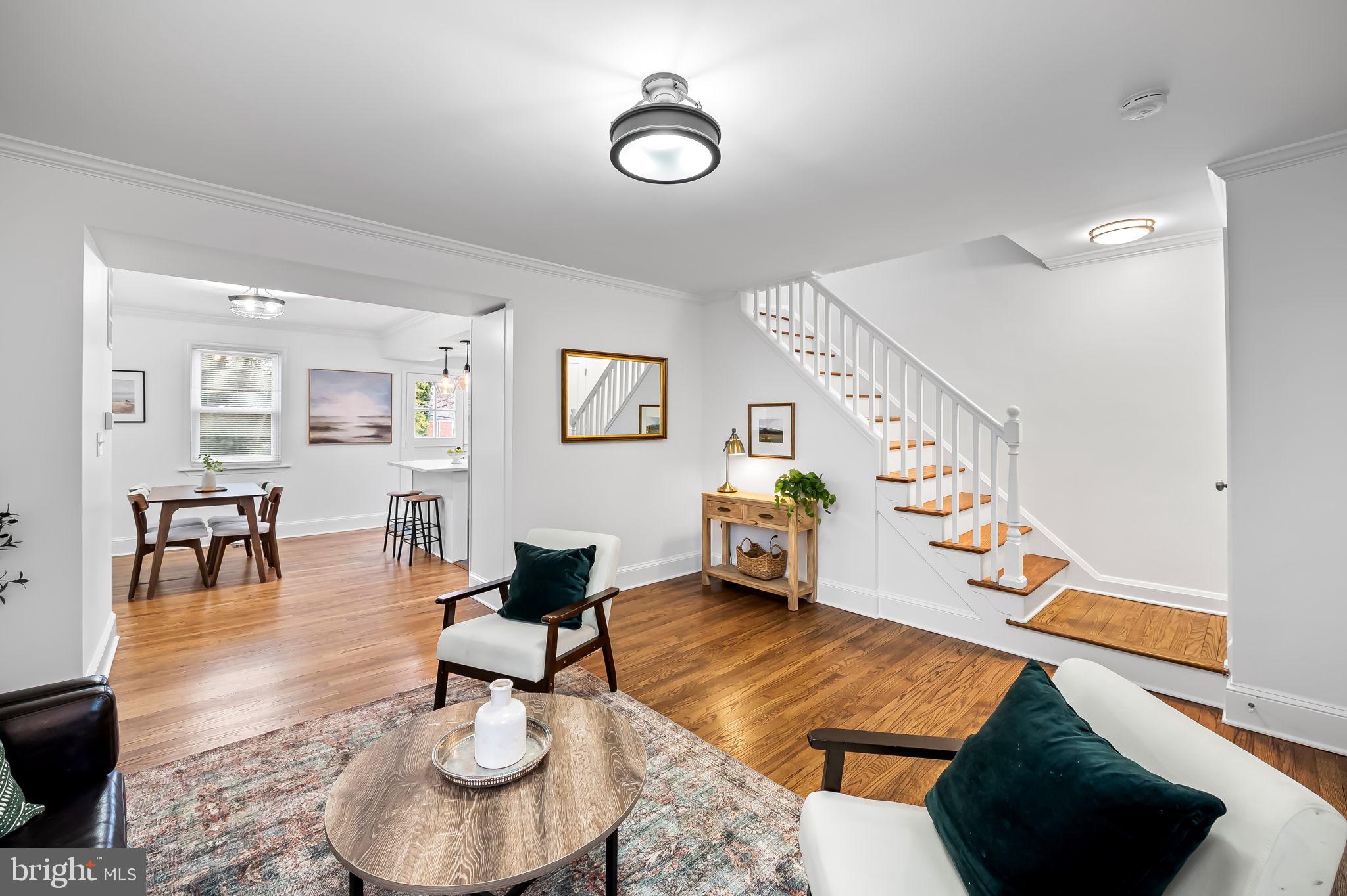 834 Evesham Avenue Baltimore, MD 21212 - Photo 6 of 37 a living room with furniture and a wooden floor