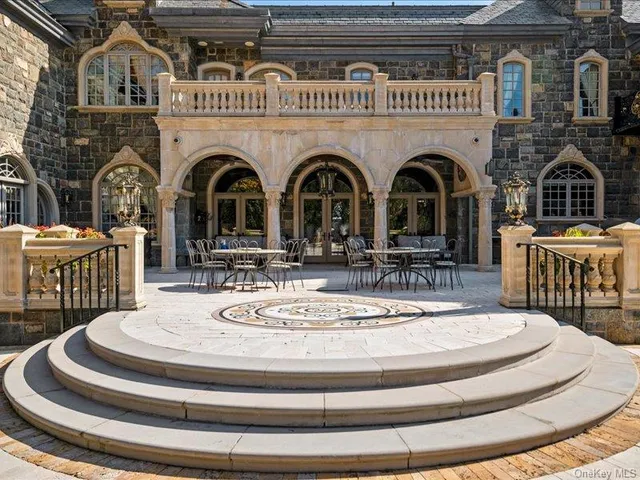 a view of a building with a swimming pool