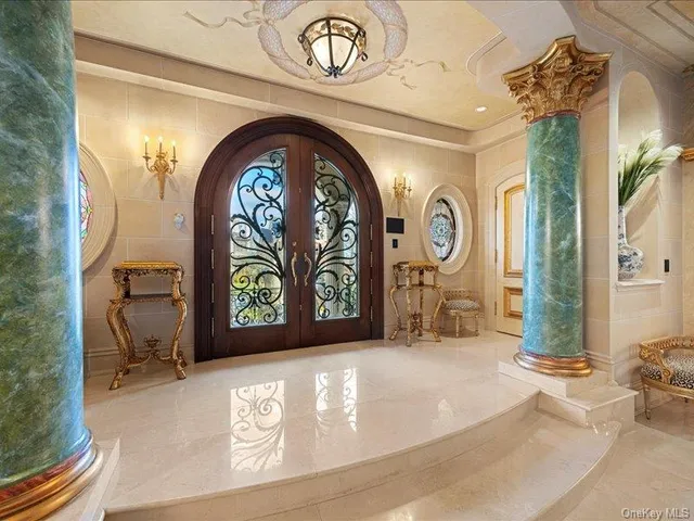 an entryway with a front door