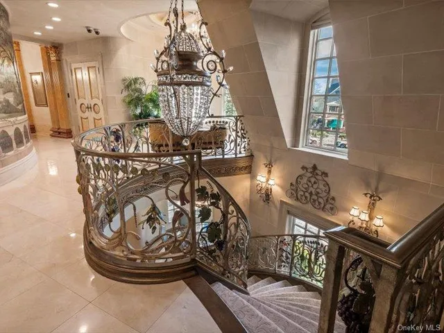 a view of a couches with wooden floor