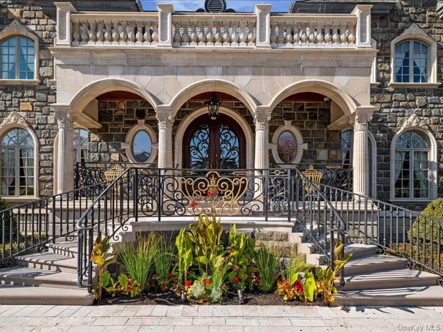 a front view of a building with glass windows