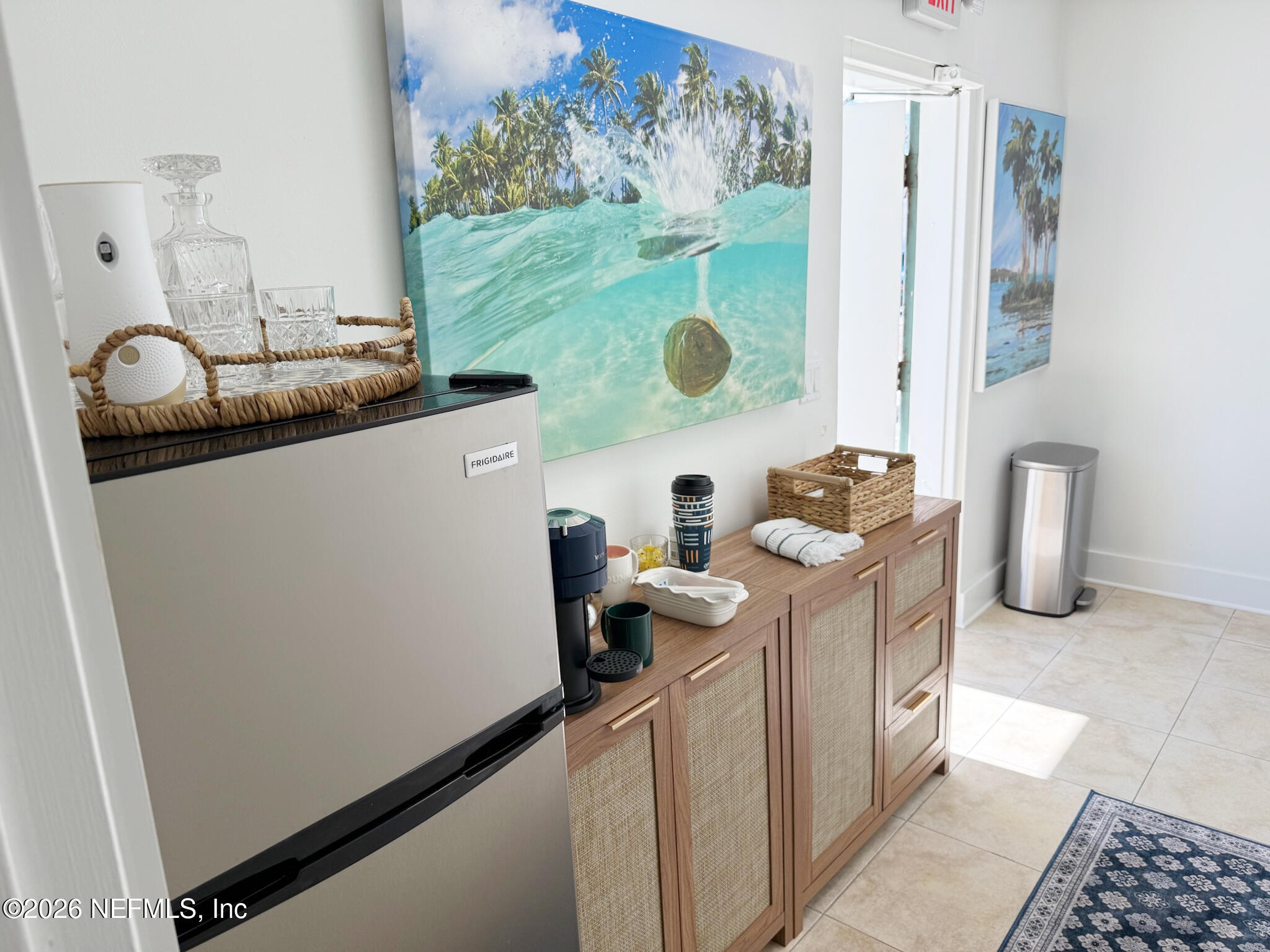 1301 Penman Road, Unit C Jacksonville Beach, FL 32250 - Photo 11 of 14 a kitchen with a refrigerator and a stove