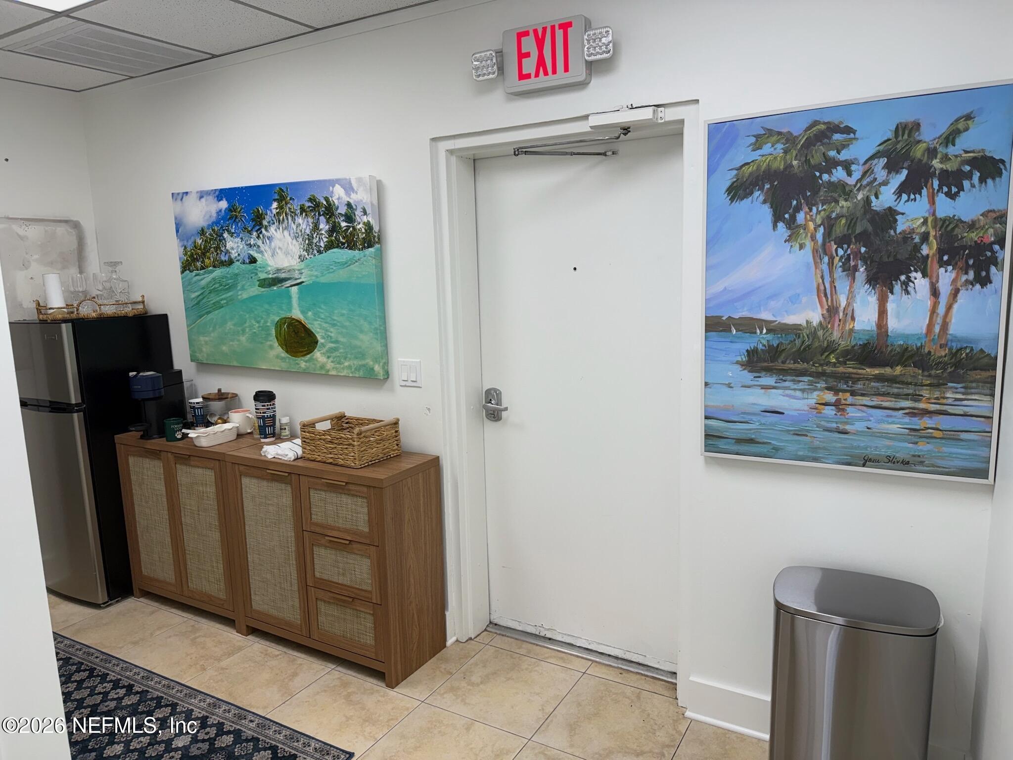 1301 Penman Road, Unit C Jacksonville Beach, FL 32250 - Photo 9 of 11 KITCHEN AREA AND EXIT