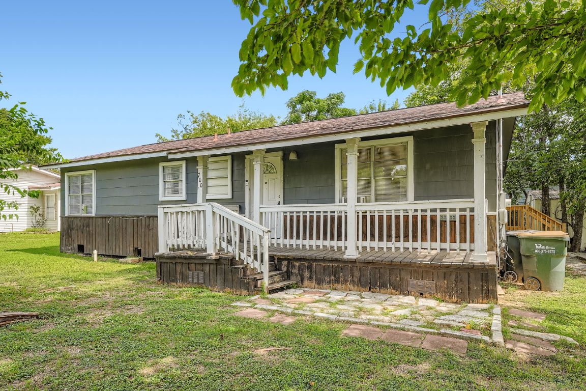 700 Blanco Street Kyle, TX 78640 - Photo 4 of 29 front view of a house with a yard