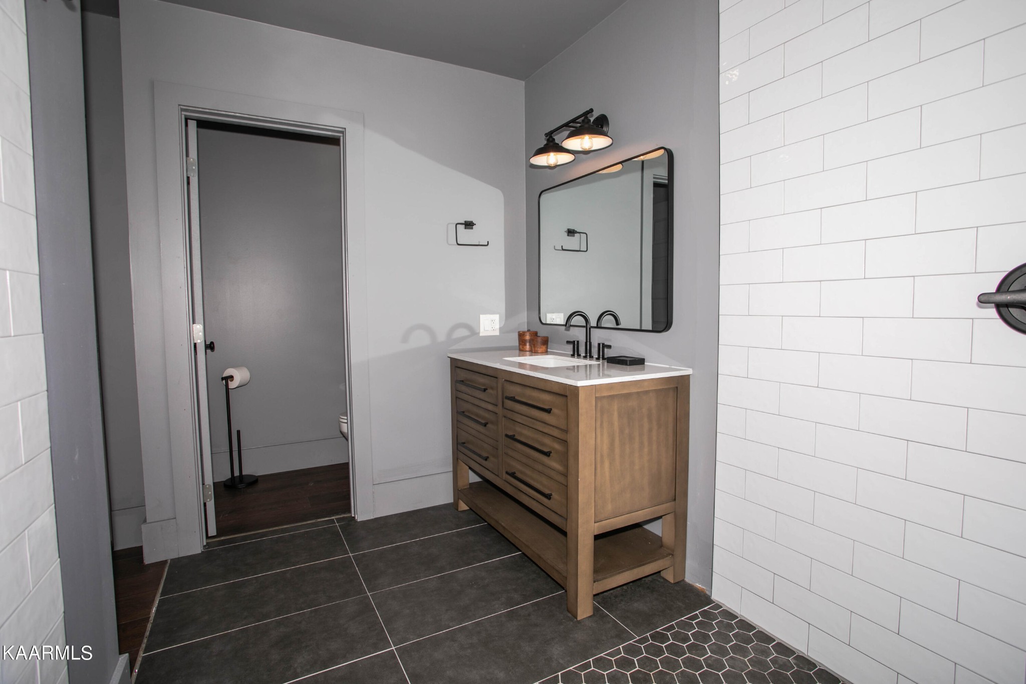 1735 Redwing Lane New Market, TN 37820 - Photo 12 of 33 a bathroom with a sink vanity and a mirror