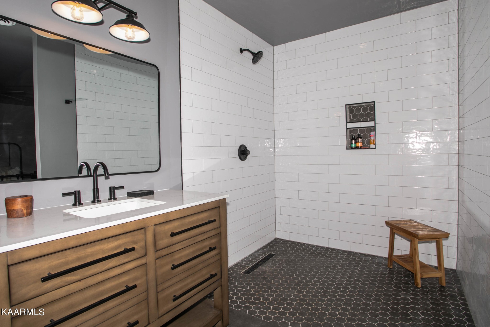 1735 Redwing Lane New Market, TN 37820 - Photo 13 of 33 a bathroom with a sink and a mirror