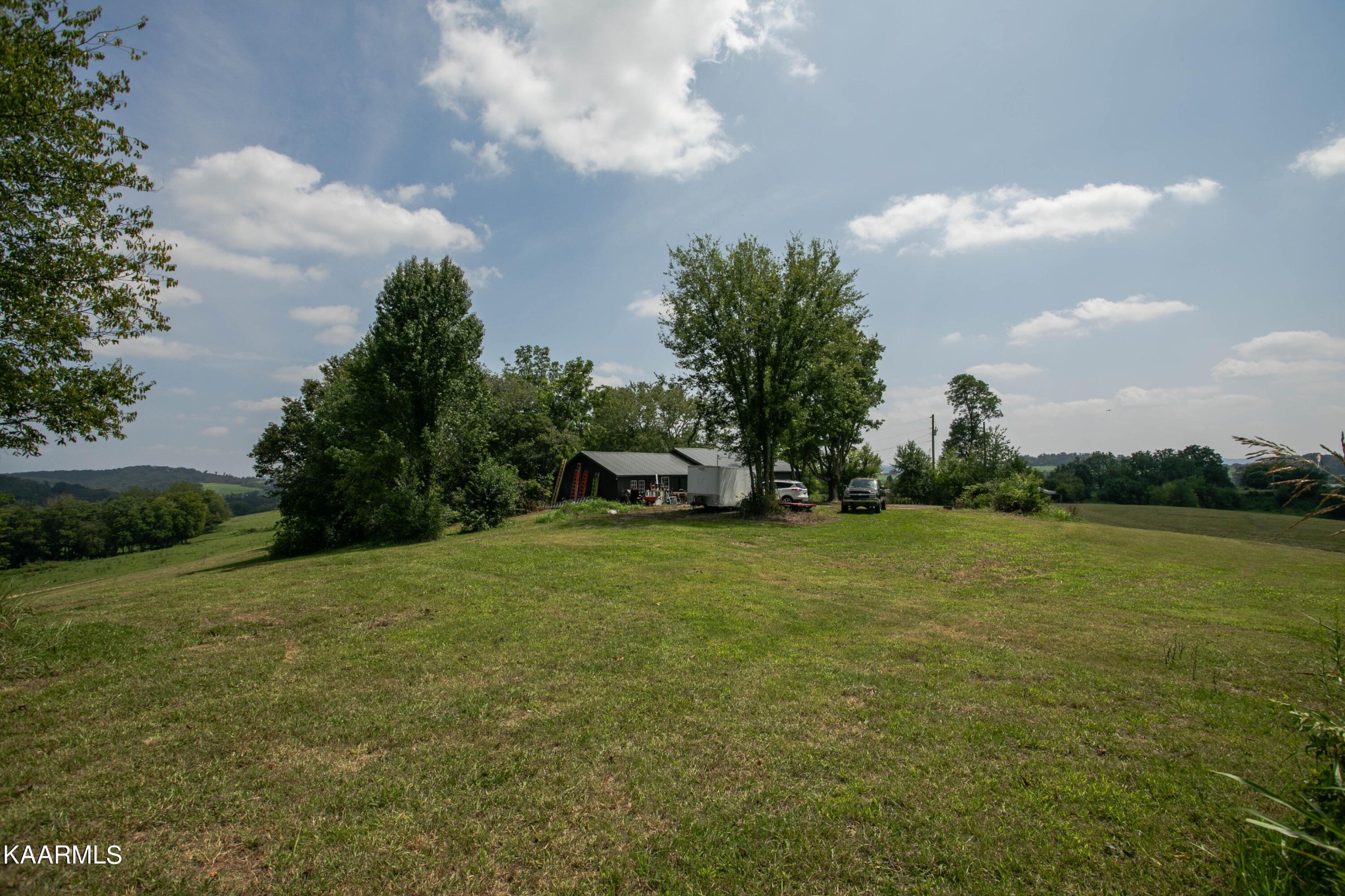 1735 Redwing Lane New Market, TN 37820 - Photo 28 of 33 a view of a field of grass and trees