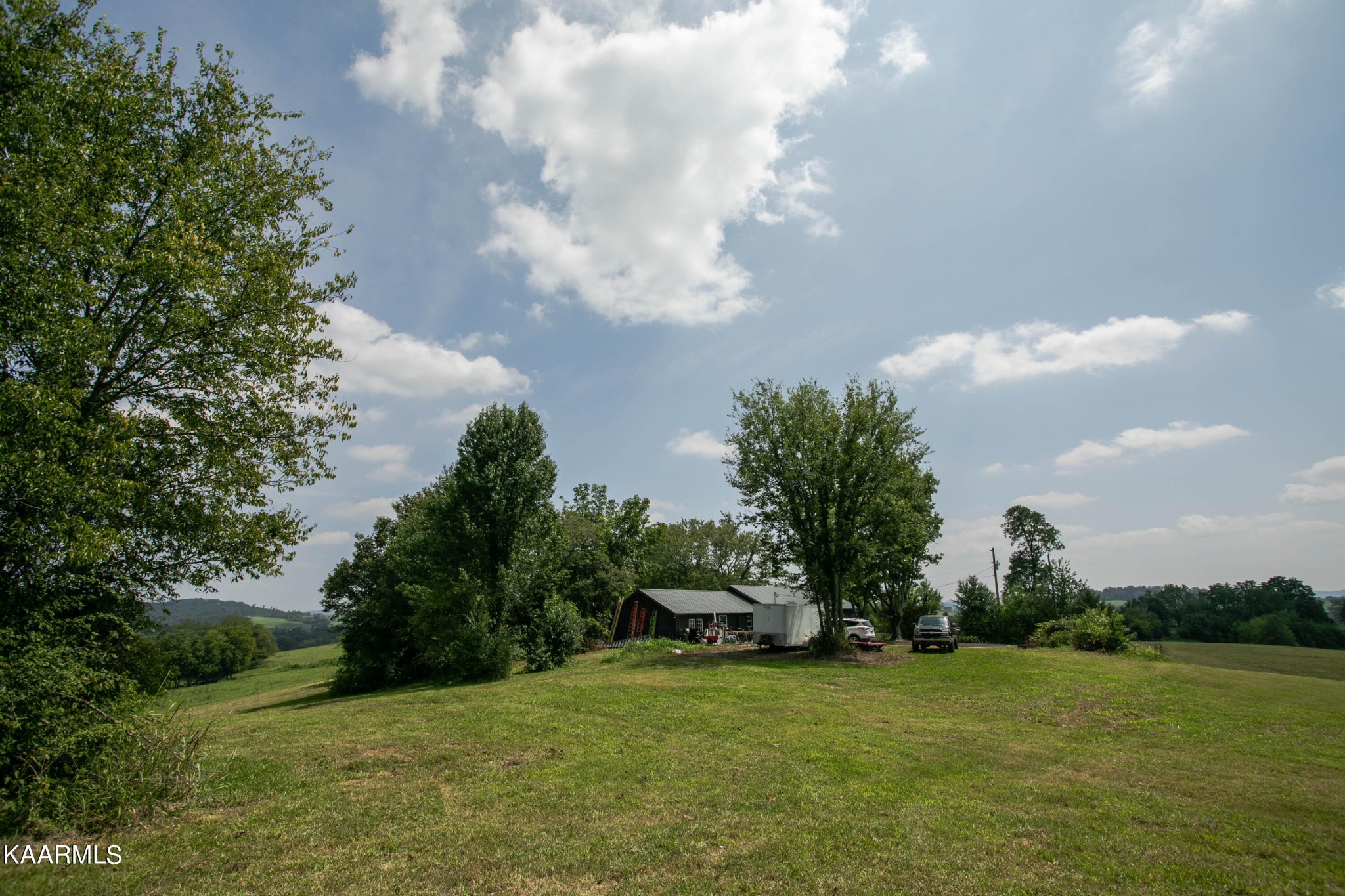 1735 Redwing Lane New Market, TN 37820 - Photo 29 of 33 a backyard of a house with lots of green space