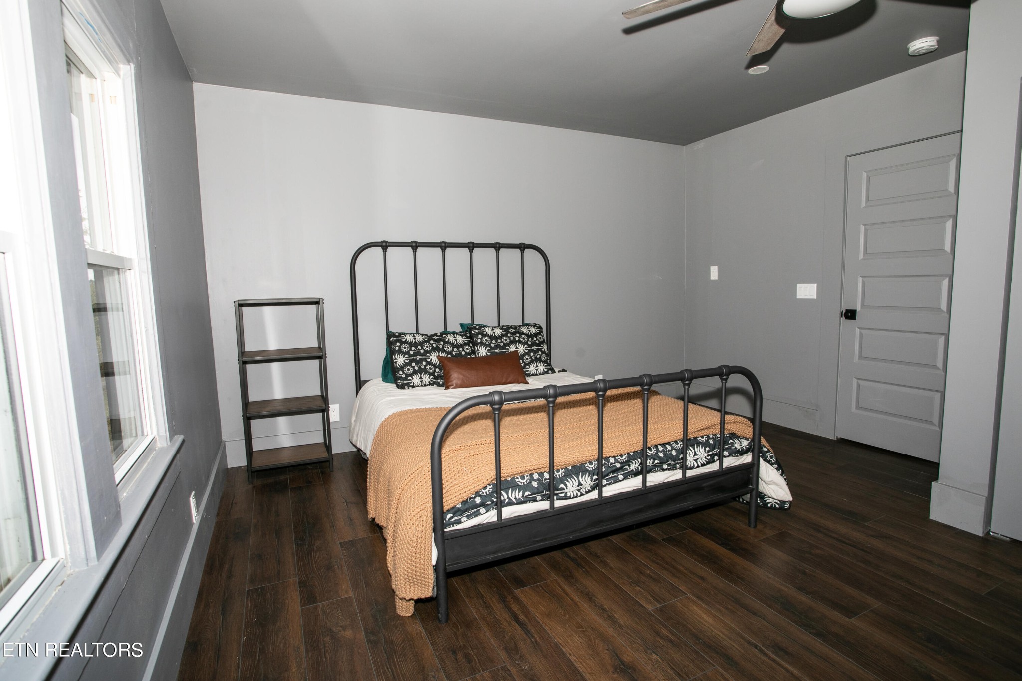 1735 Redwing Lane New Market, TN 37820 - Photo 10 of 33 a bedroom with a bed next to a large window