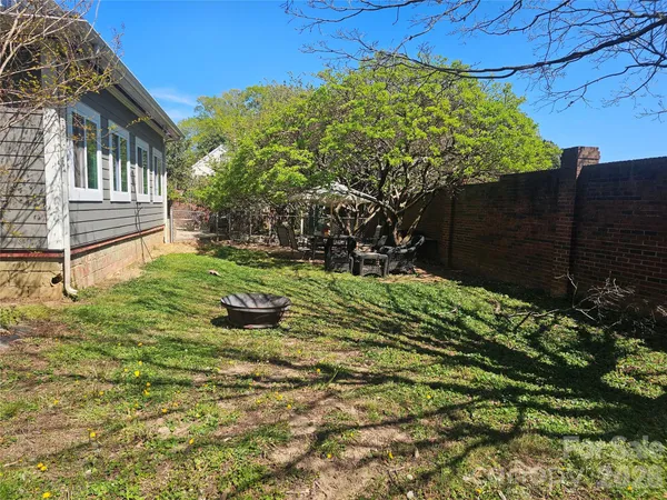 a view of a backyard with plants