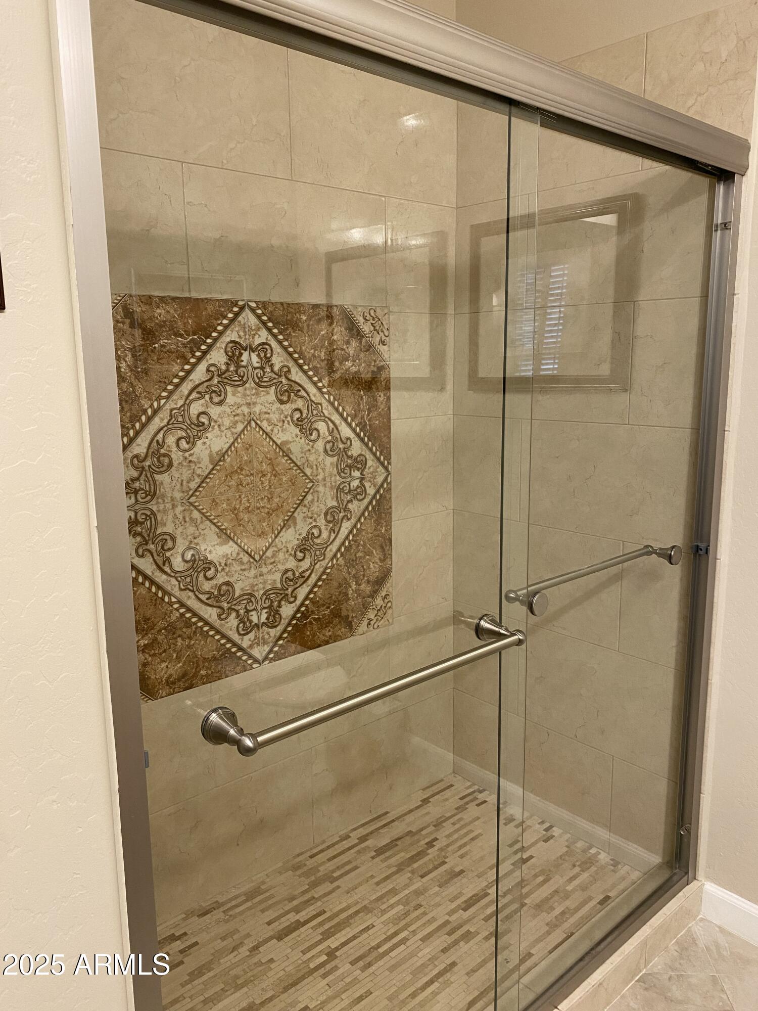 4777 South Fulton Ranch Boulevard, Unit 1074 Chandler, AZ 85248 - Photo 15 of 28 a bathroom with a glass shower door
