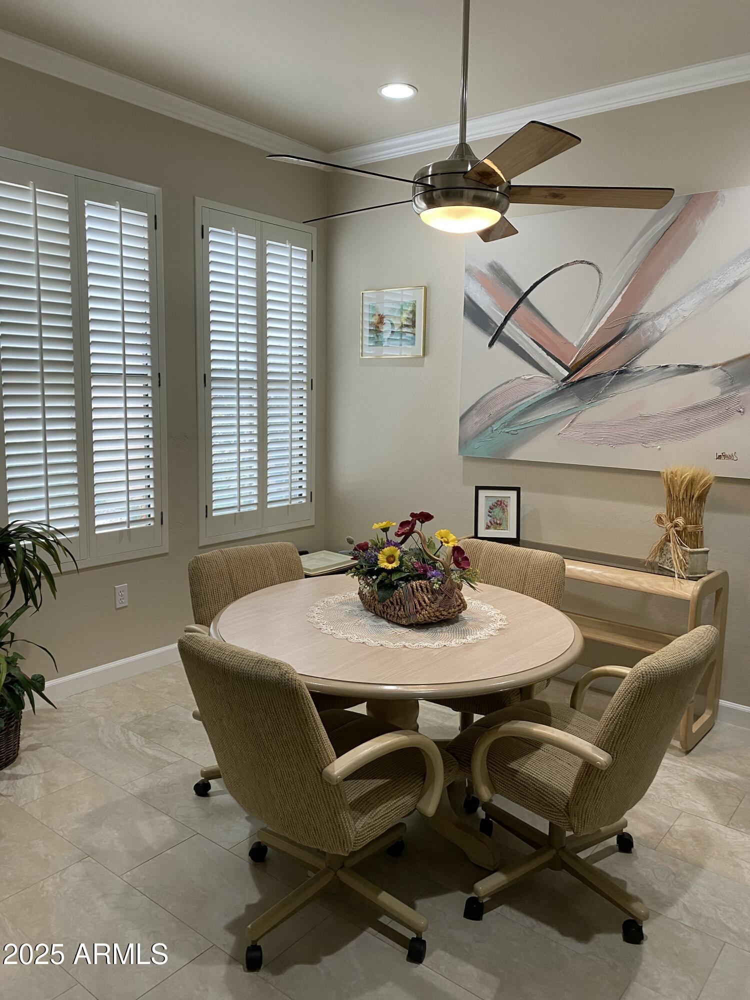 4777 South Fulton Ranch Boulevard, Unit 1074 Chandler, AZ 85248 - Photo 16 of 28 a dining room with furniture and window