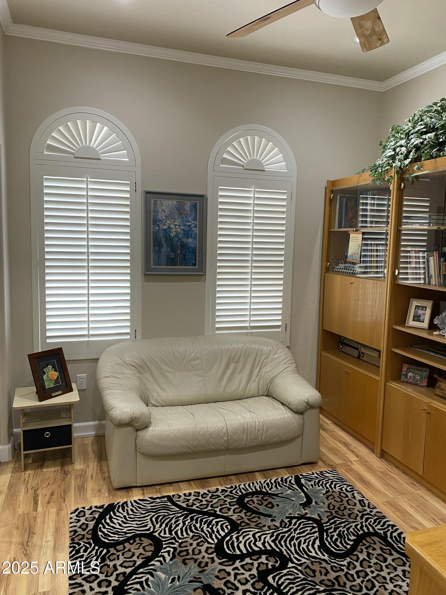 4777 South Fulton Ranch Boulevard, Unit 1074 Chandler, AZ 85248 - Photo 18 of 28 a living room with furniture and a window