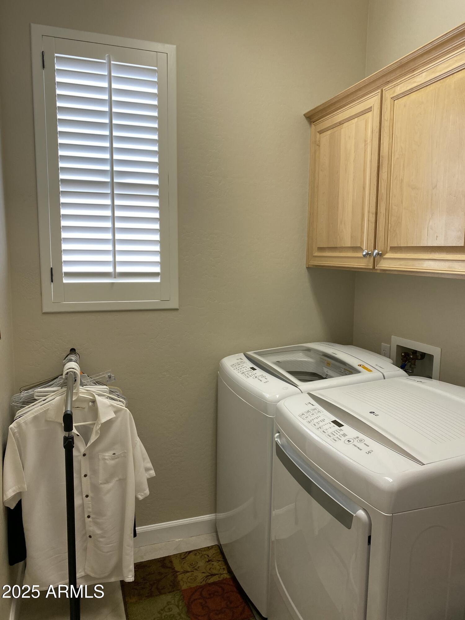 4777 South Fulton Ranch Boulevard, Unit 1074 Chandler, AZ 85248 - Photo 21 of 28 a utility room with dryer and washer