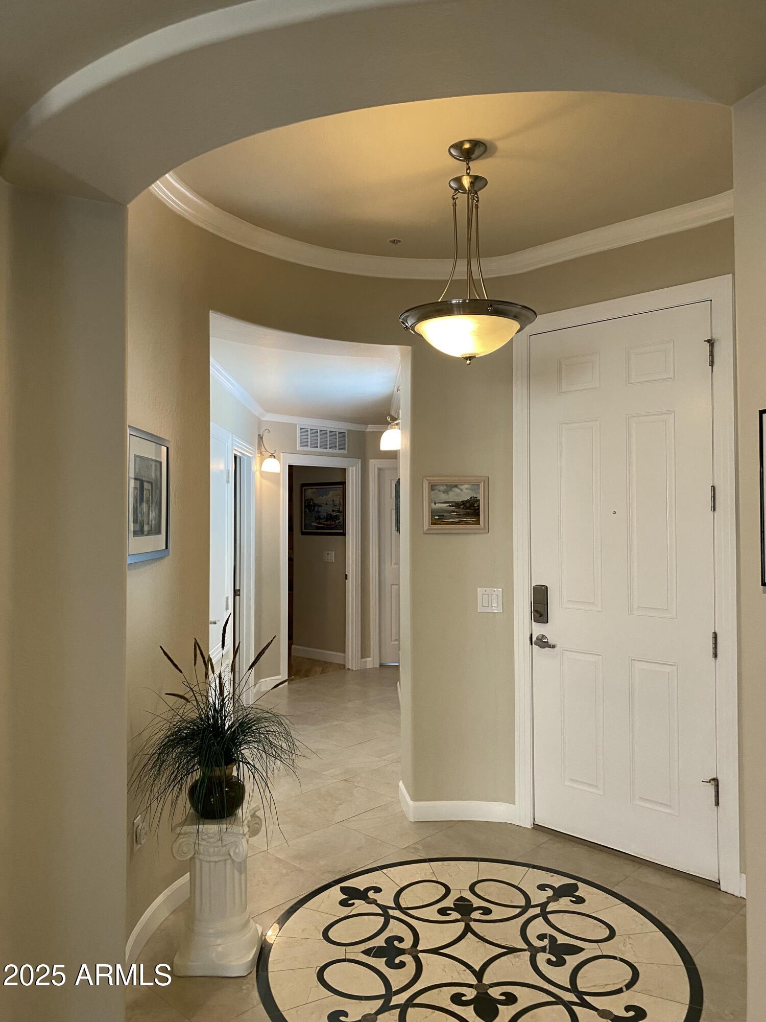 4777 South Fulton Ranch Boulevard, Unit 1074 Chandler, AZ 85248 - Photo 3 of 28 a bathroom with a sink and a mirror