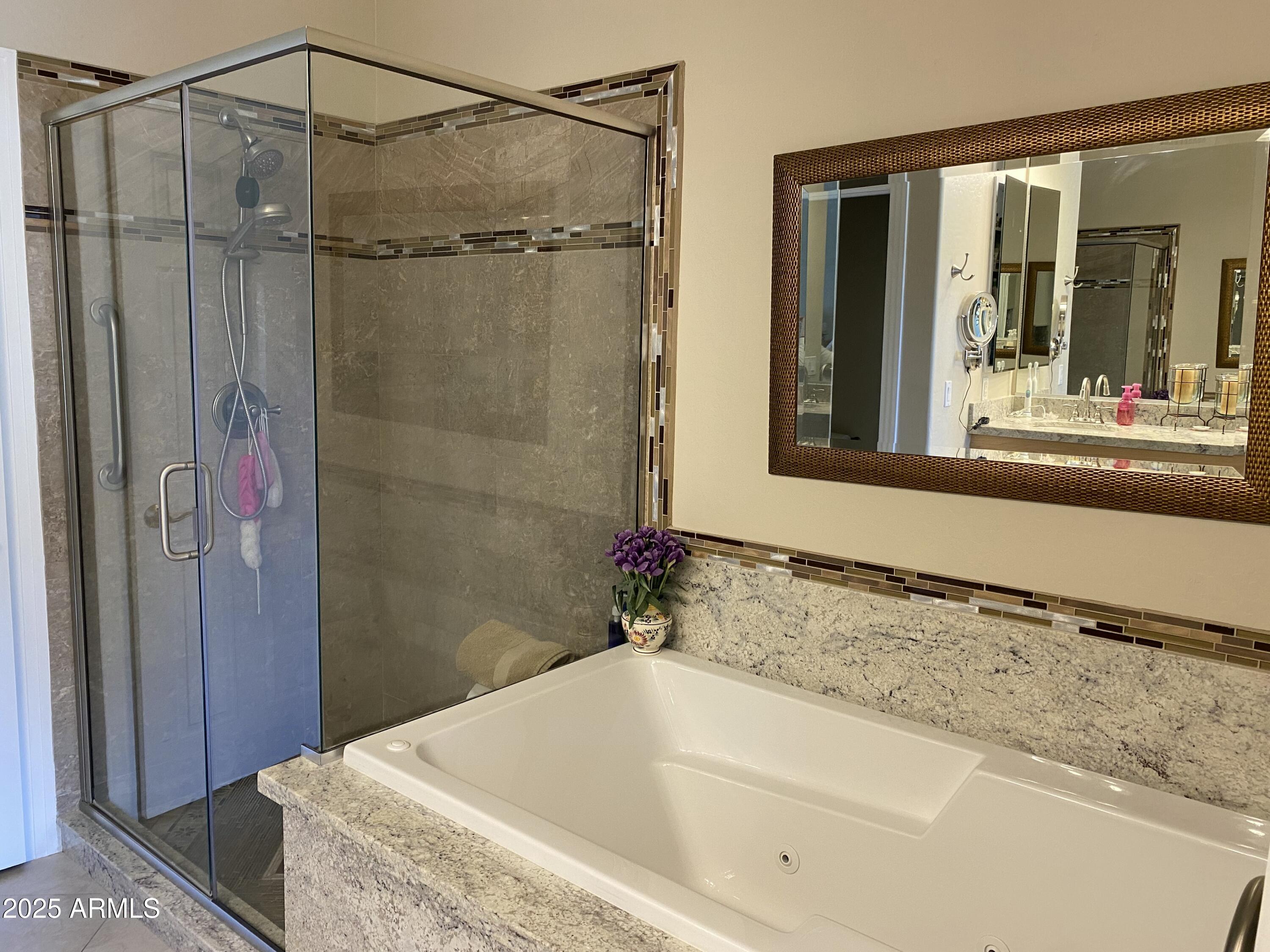 4777 South Fulton Ranch Boulevard, Unit 1074 Chandler, AZ 85248 - Photo 7 of 28 a bathroom with a granite countertop shower and a sink