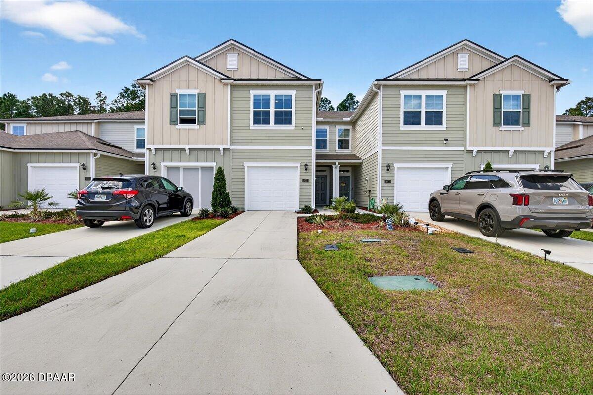 339 Redbud Road Palm Coast, FL 32137 - Photo 1 of 50 16-KBRE8771