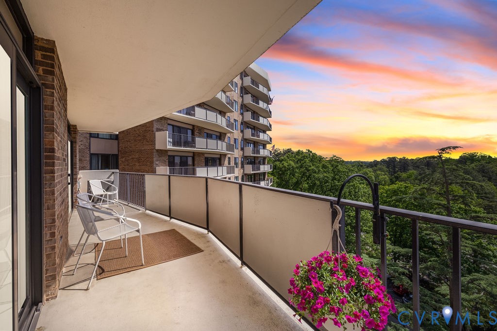 2956 Hathaway Road, Unit U704 Richmond, VA 23225 - Photo 17 of 42 Spacious balcony with concrete flooring, a frosted