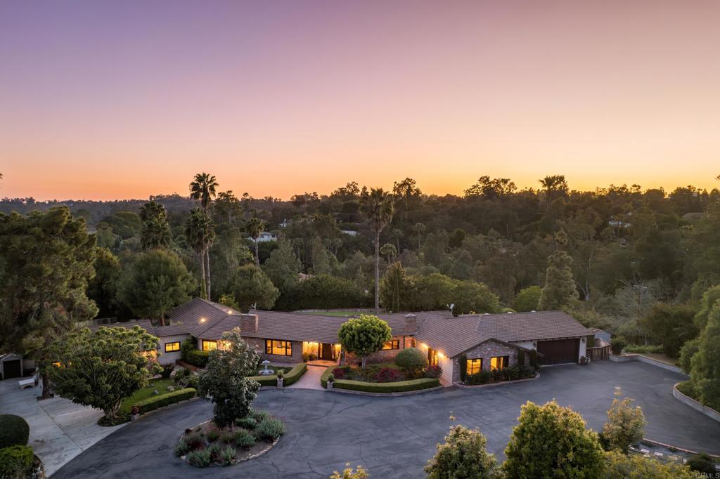 16810 Via De Santa Fe Rancho Santa Fe, CA 92091 - Photo 1 of 1 a view of a street with cars park