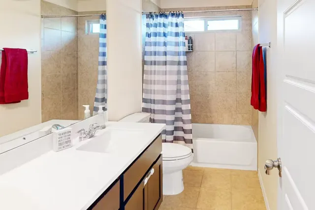 a bathroom with a sink and a bathtub
