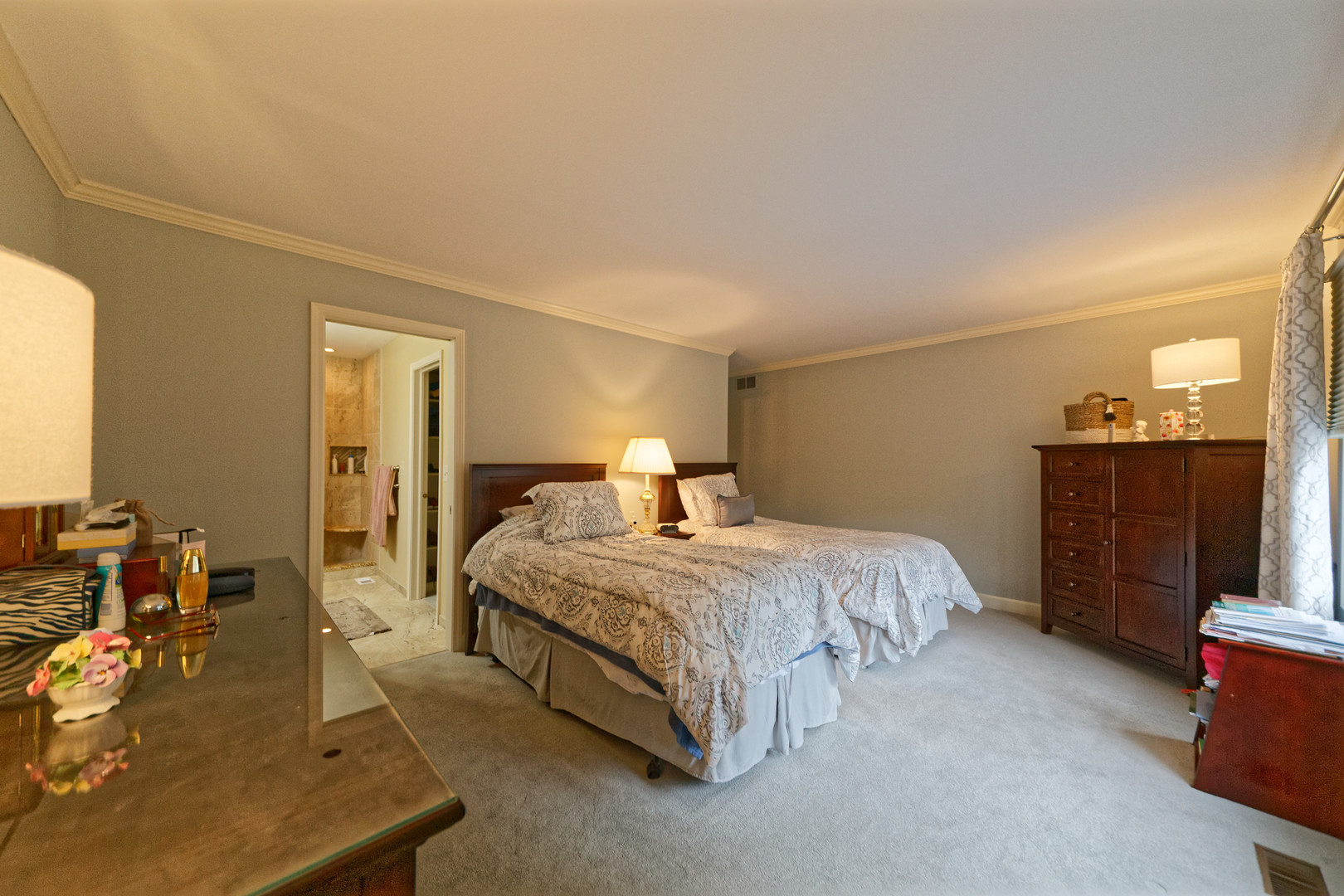 1109 Oakview Drive Wheaton, IL 60187 - Photo 15 of 23 a spacious bedroom with a bed and dresser