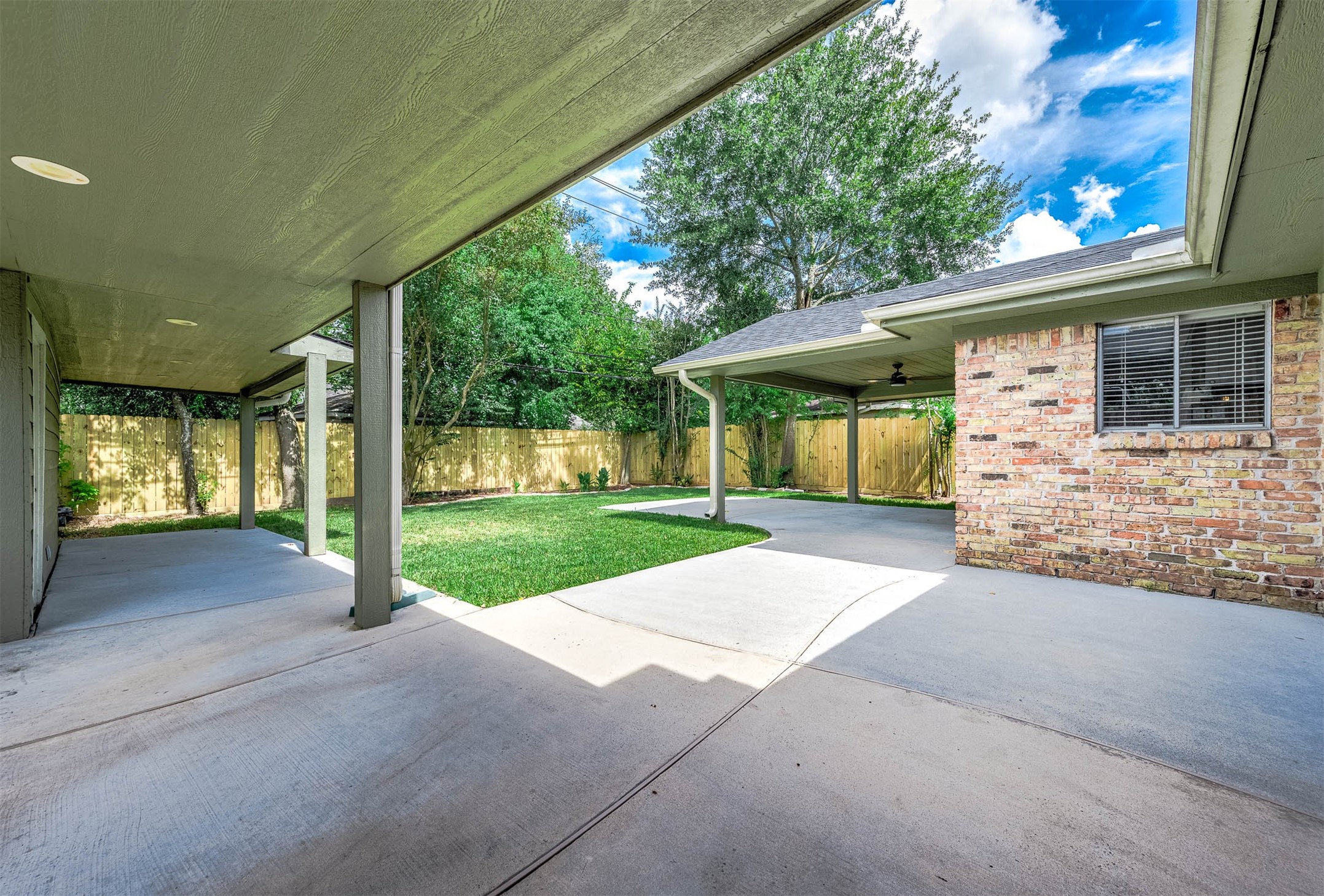 6030 Warm Springs Road Houston, TX 77035 - Photo 33 of 40 Covered walkway from the house to the garage help keep the heat away in Houston's 6 plus summer months.