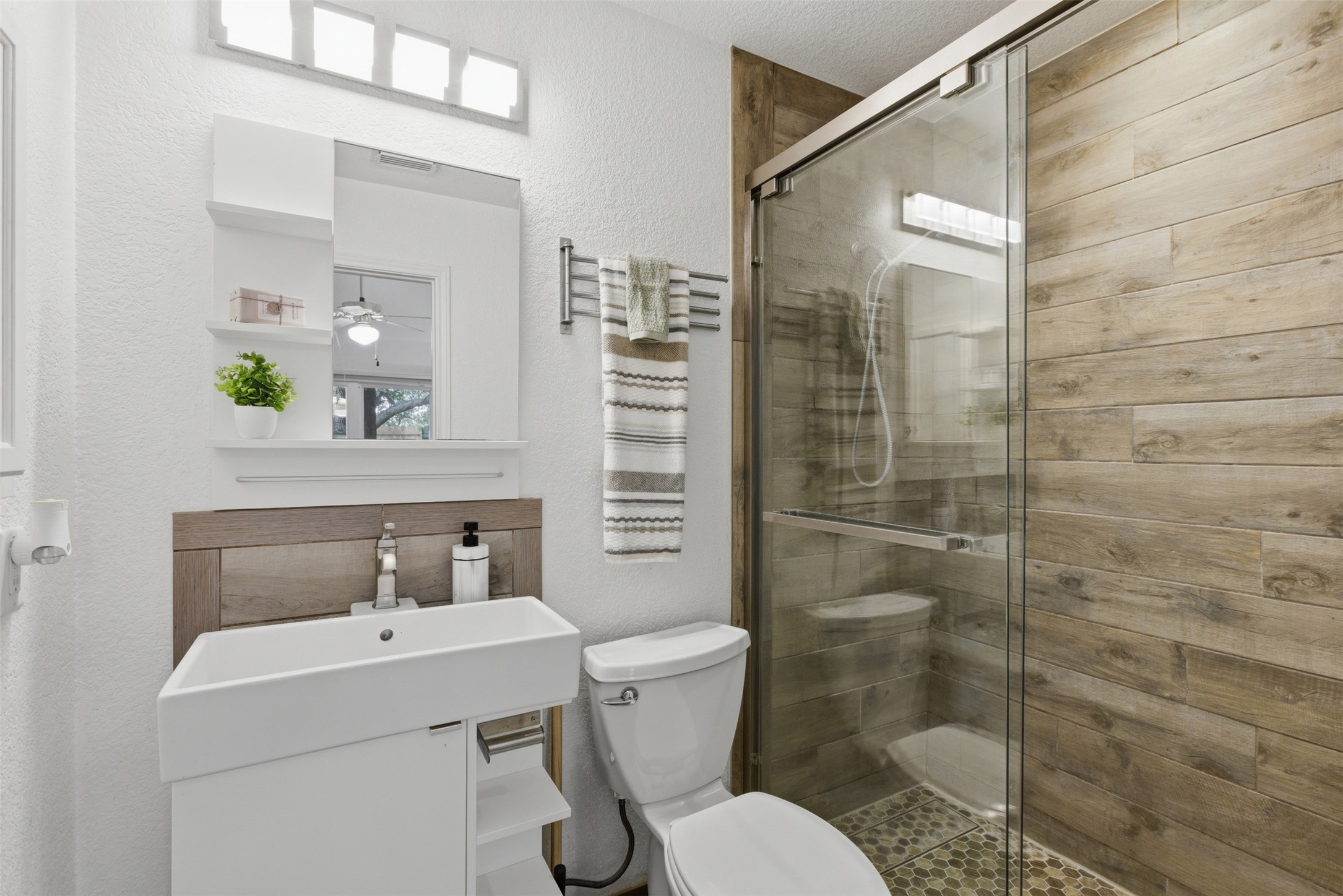 112 Prairie Springs Loop Georgetown, TX 78626 - Photo 12 of 23 a bathroom with a sink toilet and shower