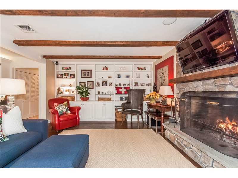 145 Marvin Ridge Road New Canaan, CT 06840 - Photo 11 of 24 a living room with furniture and a fireplace