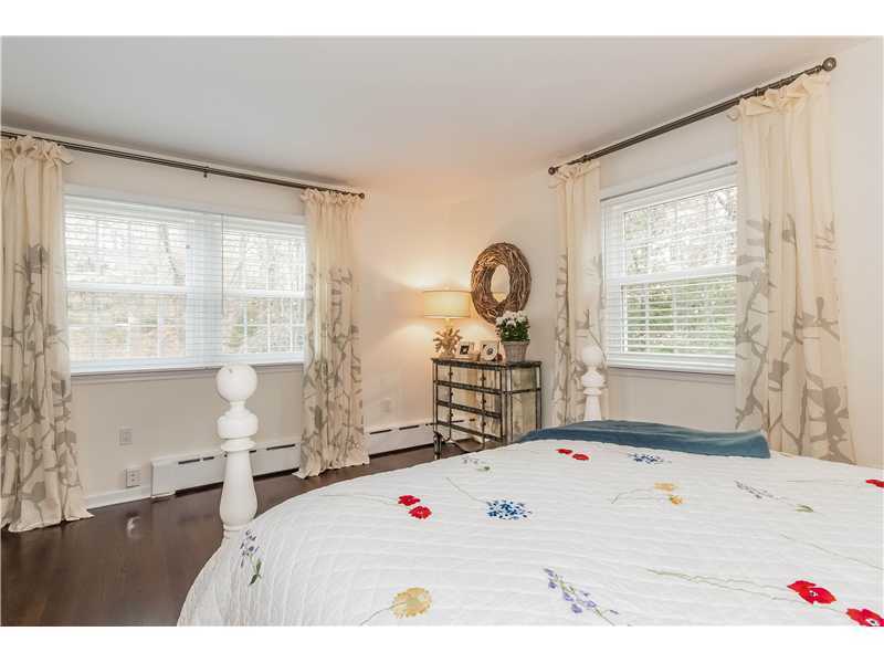 145 Marvin Ridge Road New Canaan, CT 06840 - Photo 16 of 24 a living room with furniture and a large window