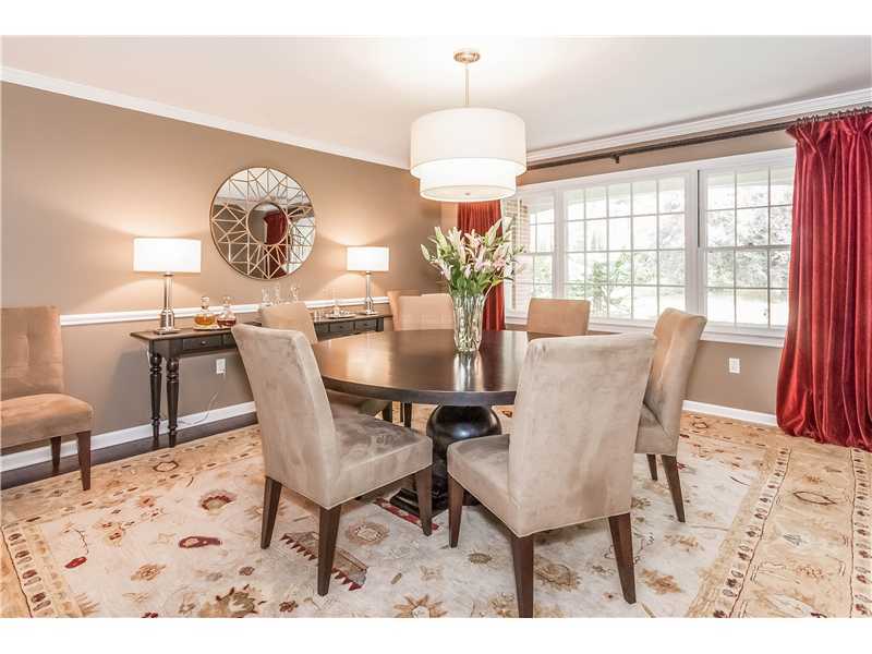 145 Marvin Ridge Road New Canaan, CT 06840 - Photo 6 of 24 a view of a dining room with furniture window and outside view