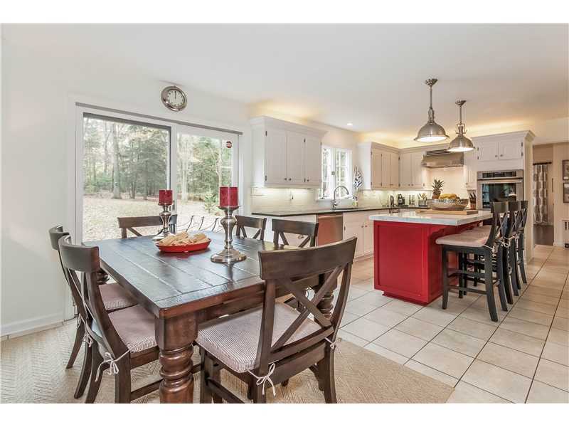 145 Marvin Ridge Road New Canaan, CT 06840 - Photo 7 of 24 a view of a dining room with furniture window and outside view