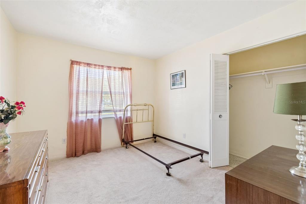 2059 Waterfall Drive Spring Hill, FL 34608 - Photo 14 of 26 a living room with a window