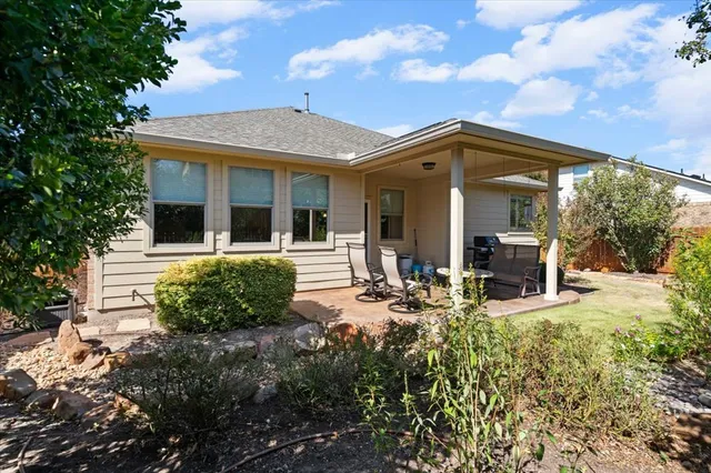a view of a house with patio